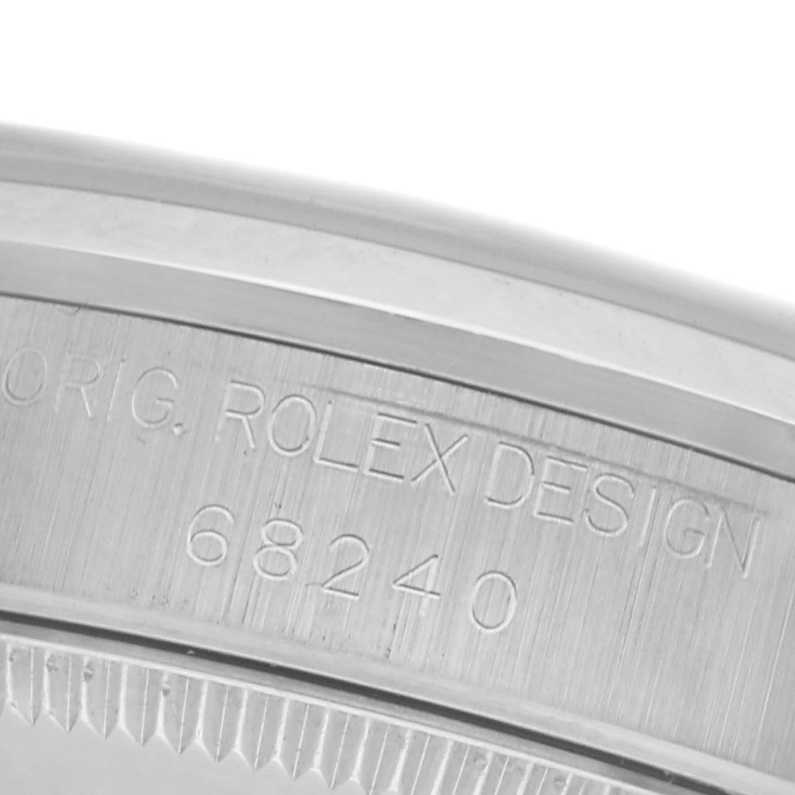 The image shows the side of the Rolex Mid-Size model 68240, focusing on the engraving of "ORIG. ROLEX DESIGN" and the model number.