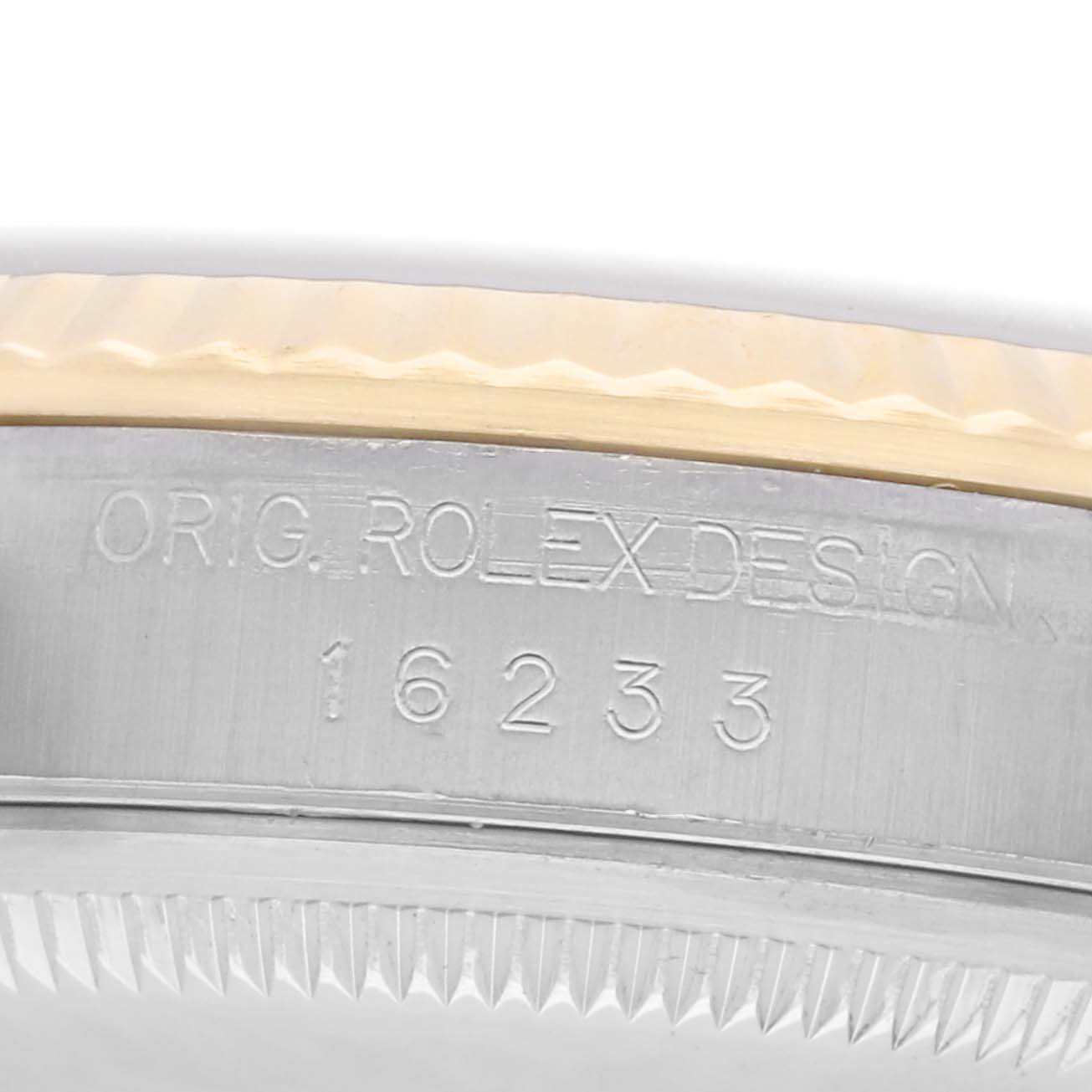 The image shows a close-up of the case side of a Rolex Datejust model 16233, highlighting the model number and part of the watch bezel.