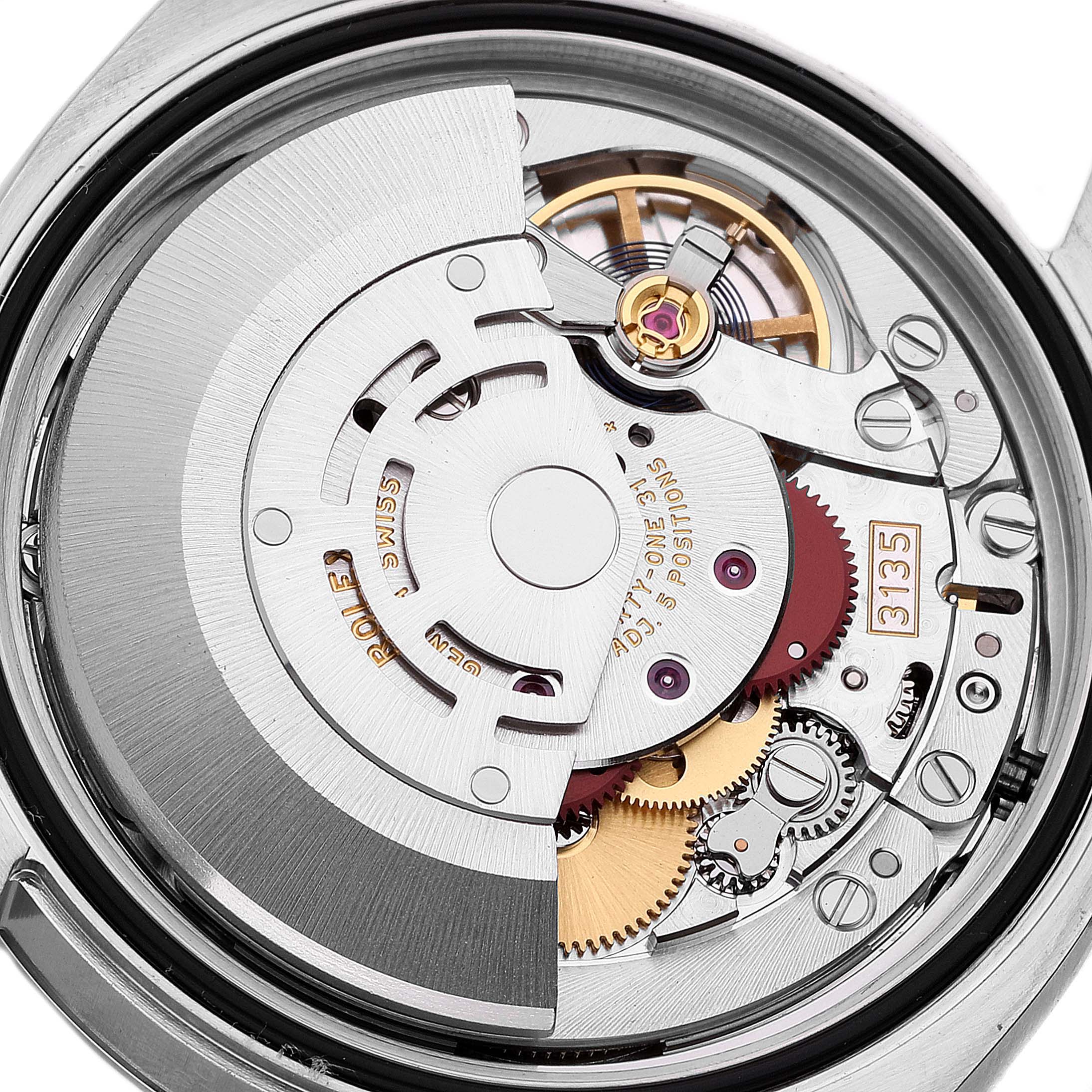This image shows a close-up of the movement and internal mechanisms of a Rolex Datejust 116200 Men's Stainless Steel White Dial 116200 Men's Stainless Steel White Dial watch viewed from the back.