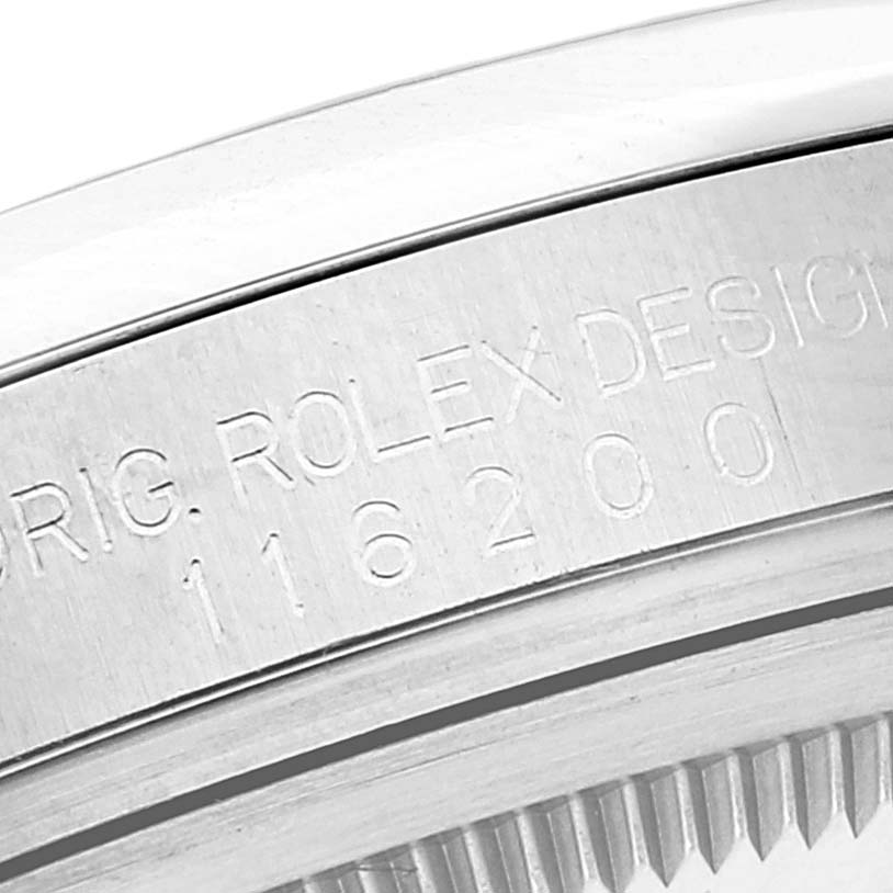 This image shows a close-up of the case edge and engraved model number of a Rolex Datejust 116200 Men's Stainless Steel White Dial 116200 Men's Stainless Steel White Dial watch.