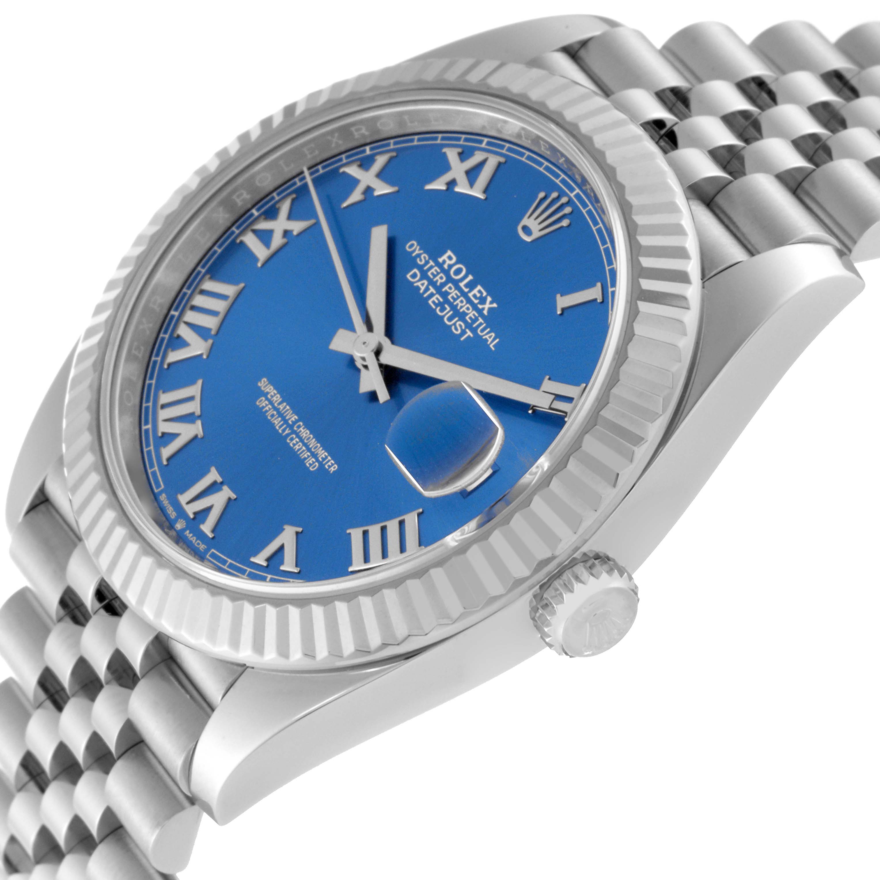 The image shows a side angle of the Rolex Datejust 41 126334 Men
s Stainless Steel Blue Dial 126334 Men
s Stainless Steel Blue Dial watch, featuring its blue dial, fluted bezel, and Jubilee bracelet.