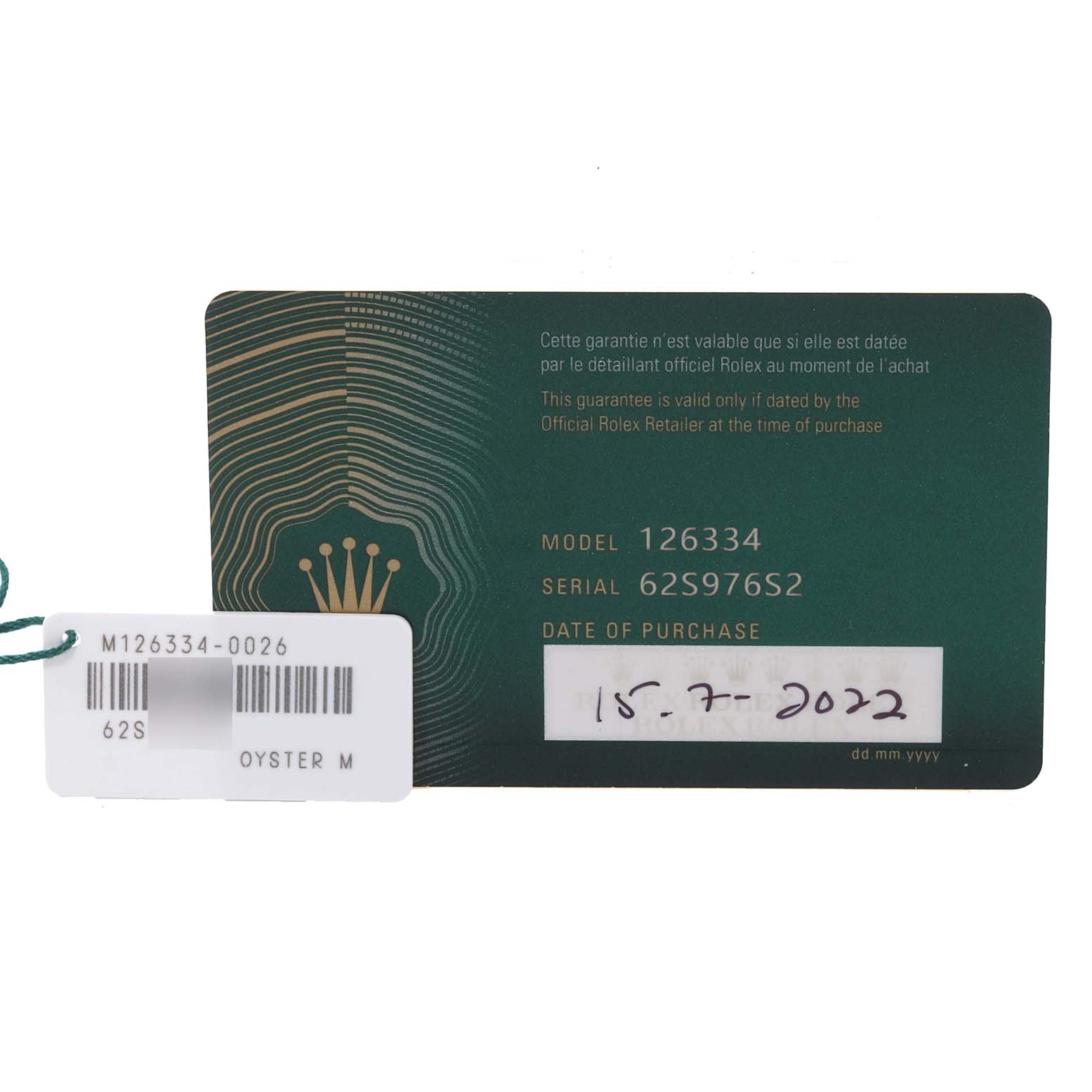 The image shows a guarantee card and tag for a Rolex Datejust 41 126334 Men
s Stainless Steel Blue Dial 126334 Men
s Stainless Steel Blue Dial model watch, including its model and serial numbers.