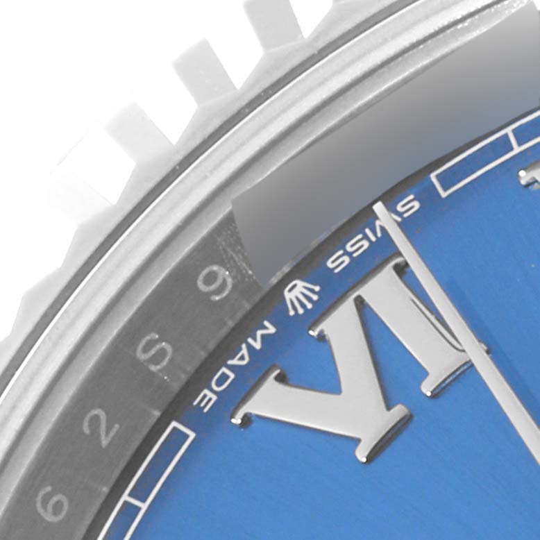 This image shows a close-up of the dial, bezel, and part of the minute hand of the Rolex Datejust 41 126334 Men
s Stainless Steel Blue Dial 126334 Men
s Stainless Steel Blue Dial watch.
