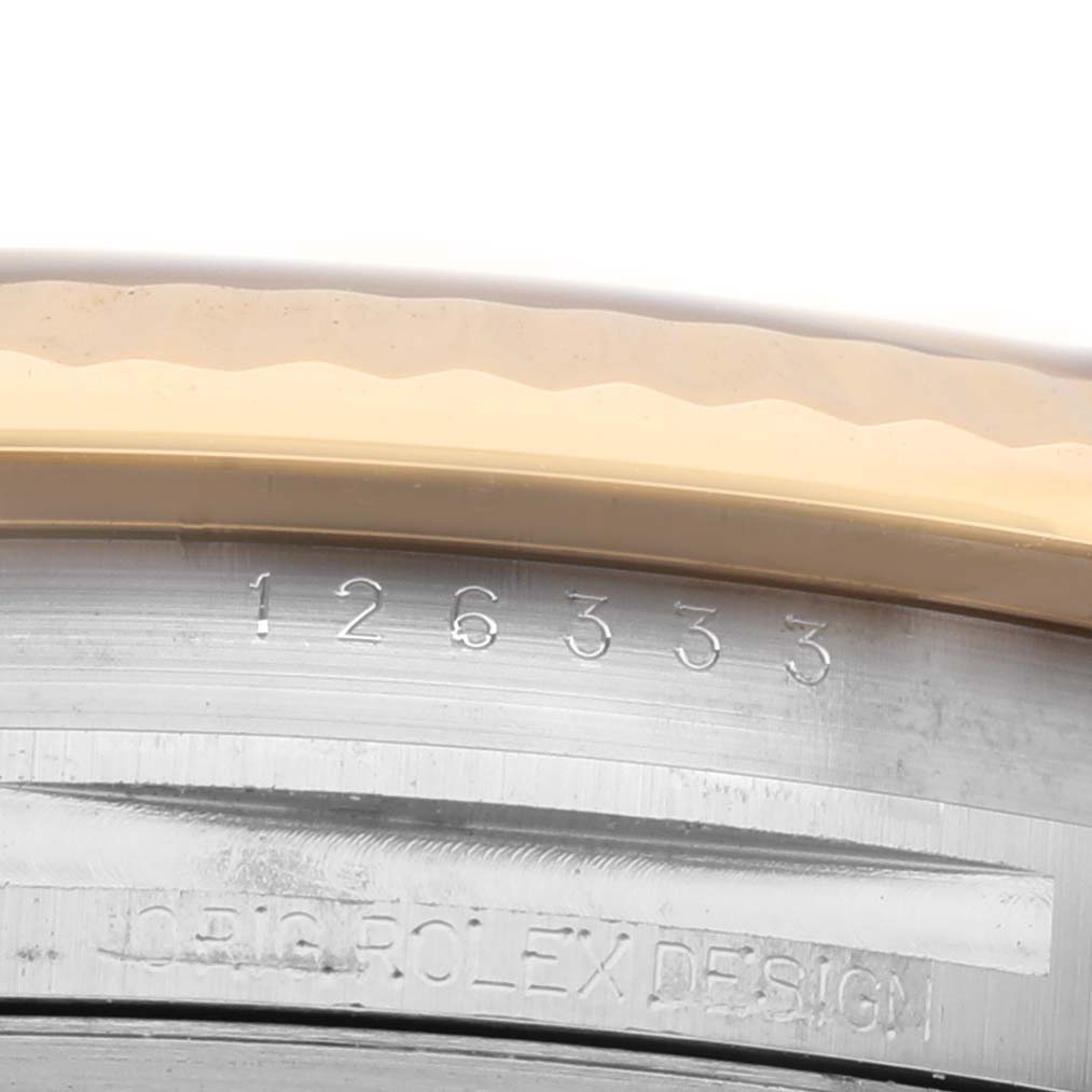 The image shows a close-up of the bezel and case side of a Rolex Datejust 41 126333 Men's Steel and Gold (two tone) Grey Dial, highlighting the model number engraving.