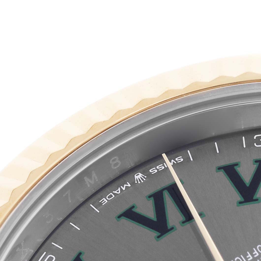 The image shows a close-up of the dial and fluted bezel of a Rolex Datejust 41 126333 Men's Steel and Gold (two tone) Grey Dial, highlighting the edge and part of the Roman numeral markers.