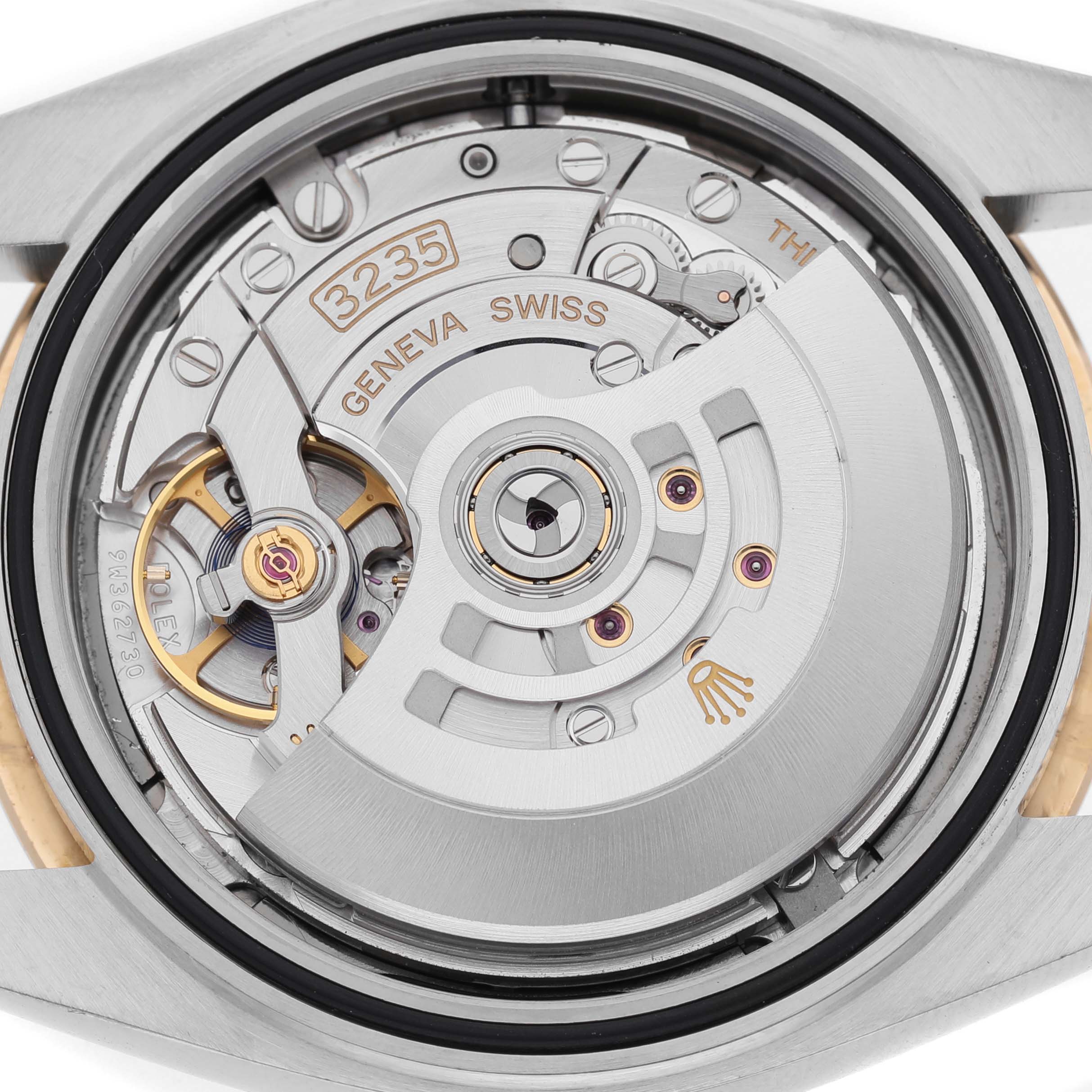 The image shows the movement interior of a Rolex Datejust 41 126333 Men's Steel and Gold (two tone) Grey Dial, highlighting the caliber 3235 in a close-up view.
