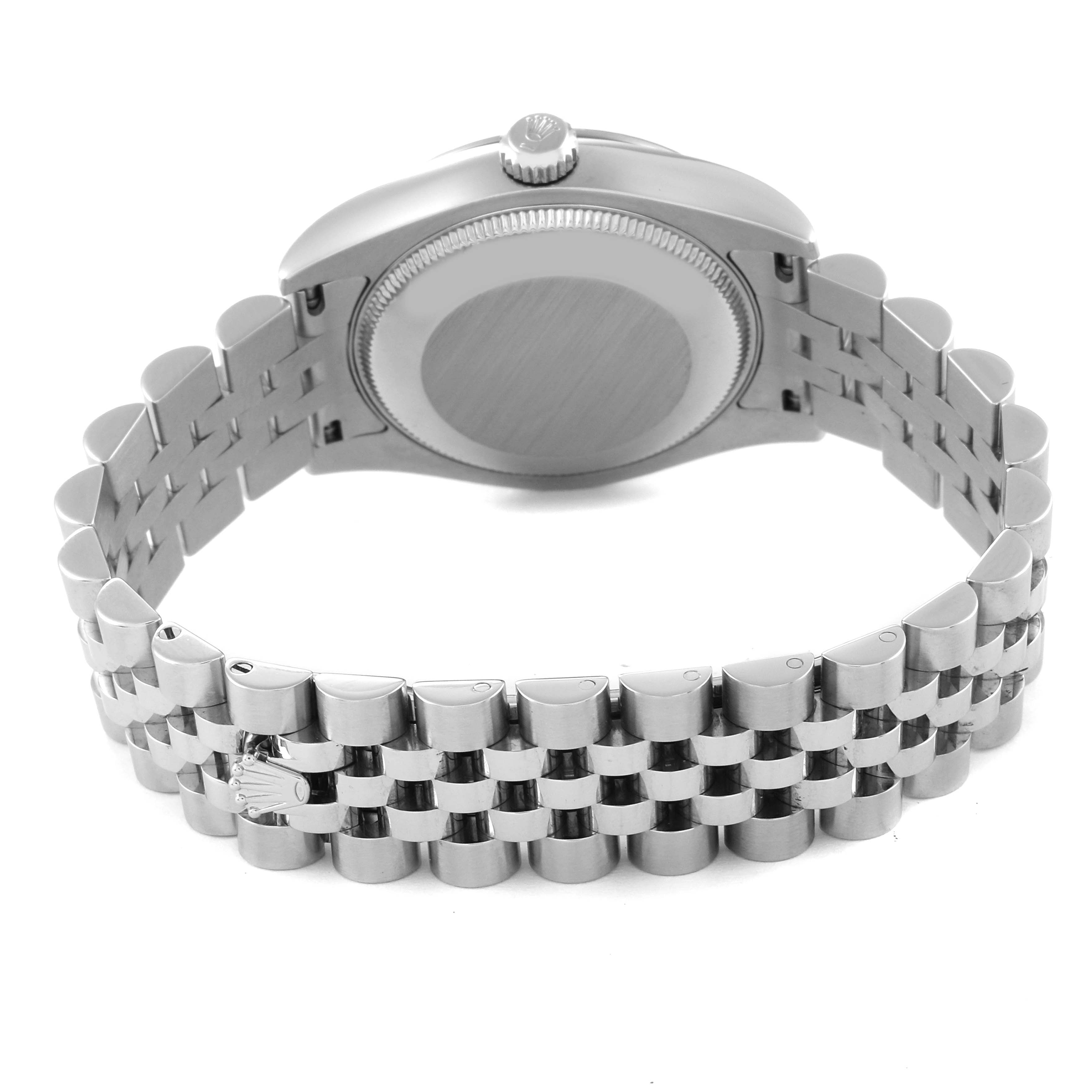 The image shows the back view of a Rolex Mid-Size 178274 Women
s Stainless Steel Silver Dial 178274 Women
s Stainless Steel Silver Dial model watch, focusing on the case back and the jubilee bracelet.