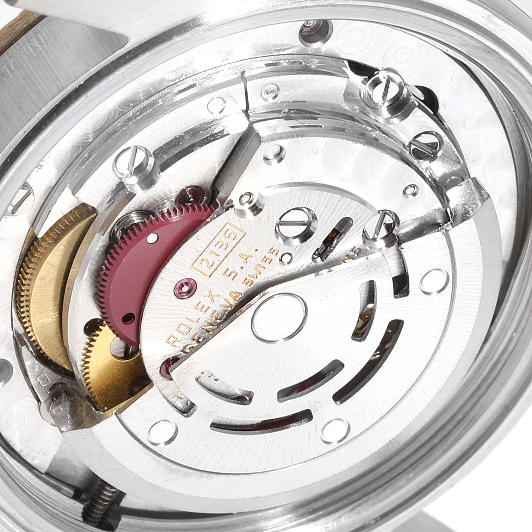This image shows the internal mechanism and movement of a Rolex Datejust 68273  Women
s Steel and Gold (two tone) Champagne Dial 68273  Women
s Steel and Gold (two tone) Champagne Dial watch from a close-up angle.