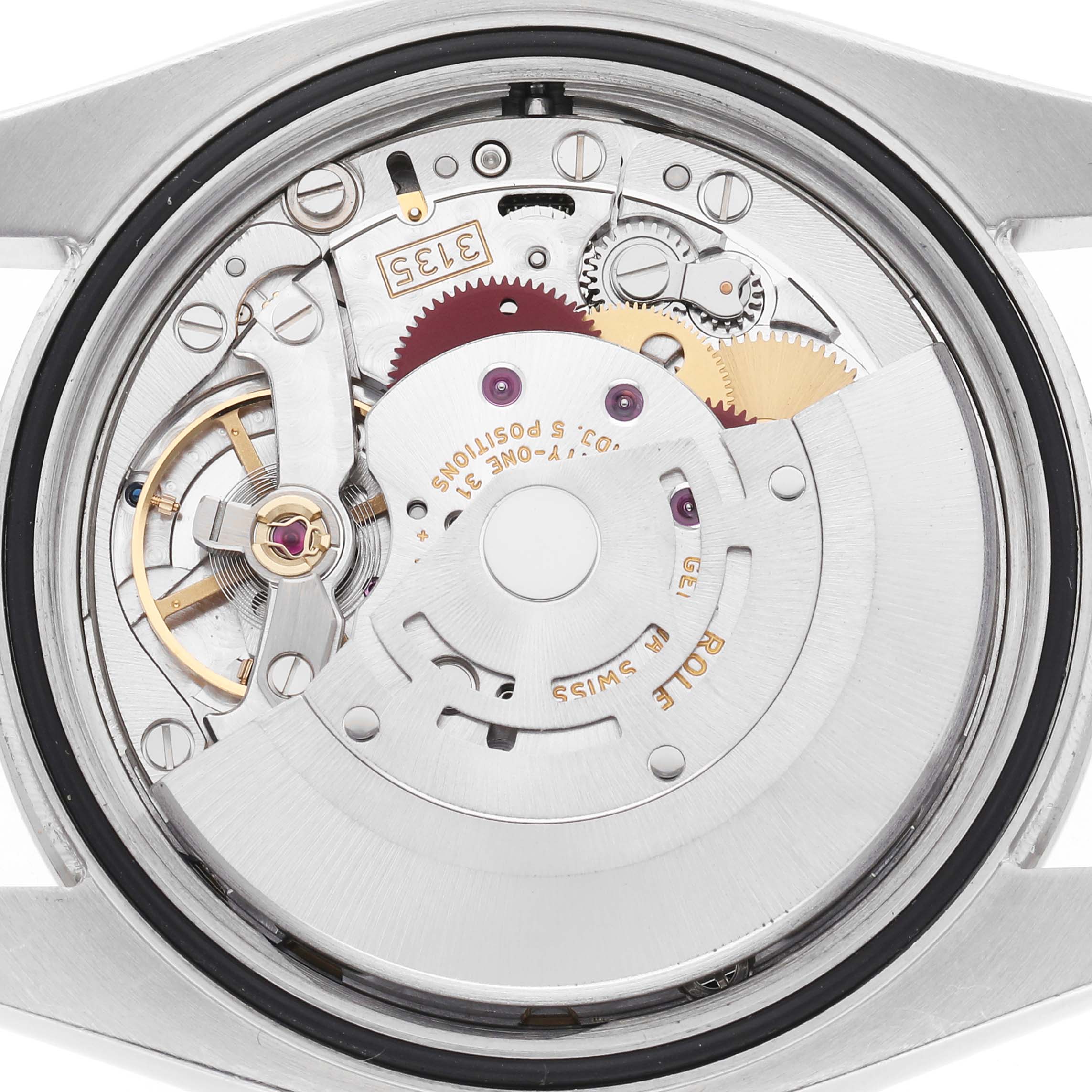 The image shows the movement mechanism of a Rolex Datejust model 116244 from the back, highlighting gears and components.