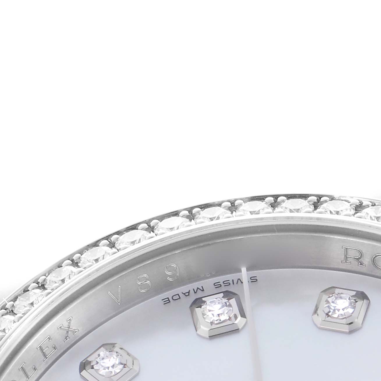 The image shows a close-up of a Rolex Datejust model 116244, highlighting the diamond-set bezel, part of the dial, and diamond hour markers.