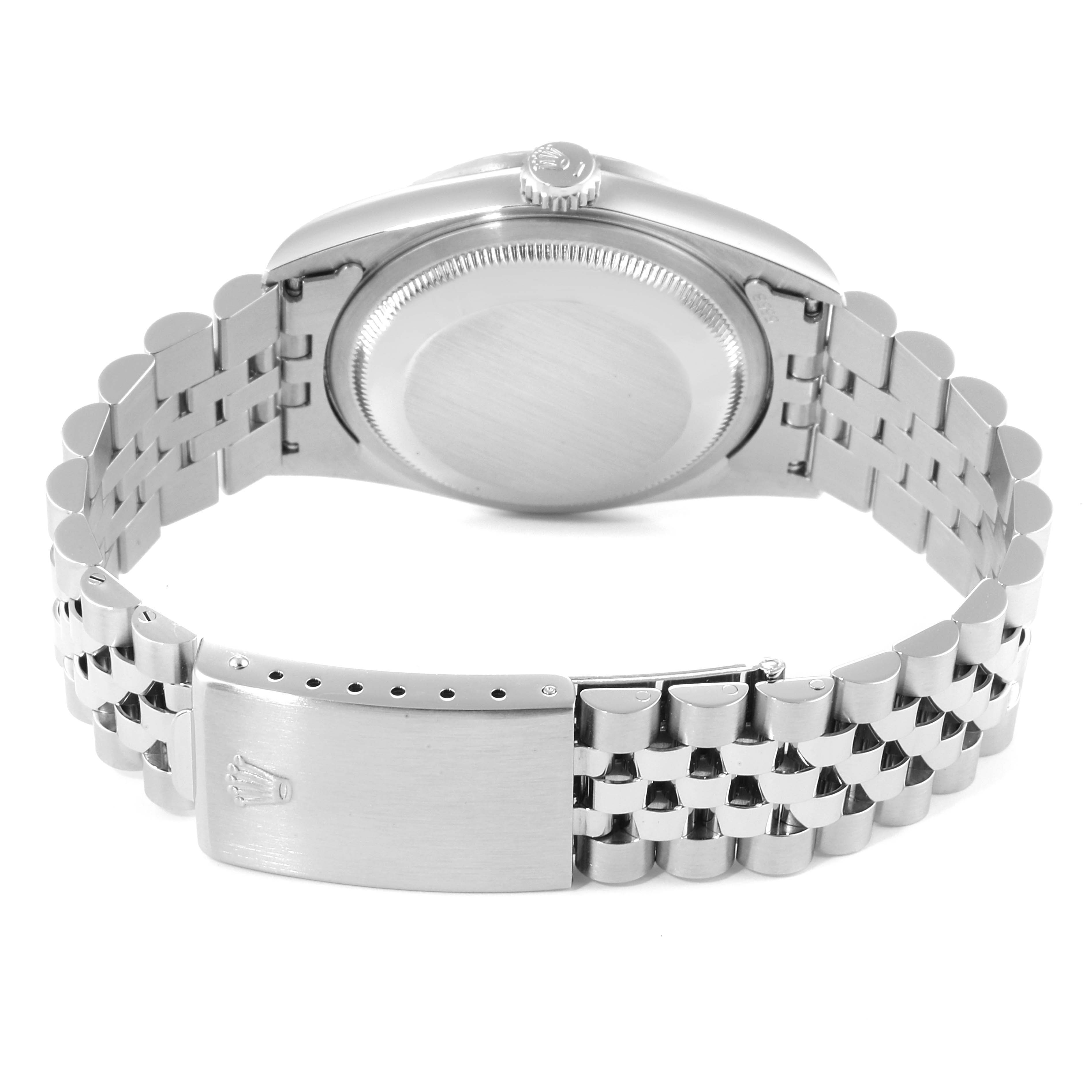 This image shows the back case and bracelet clasp of a Rolex Datejust 16220 Men's Stainless Steel Silver Dial 16220 Men's Stainless Steel Silver Dial watch.