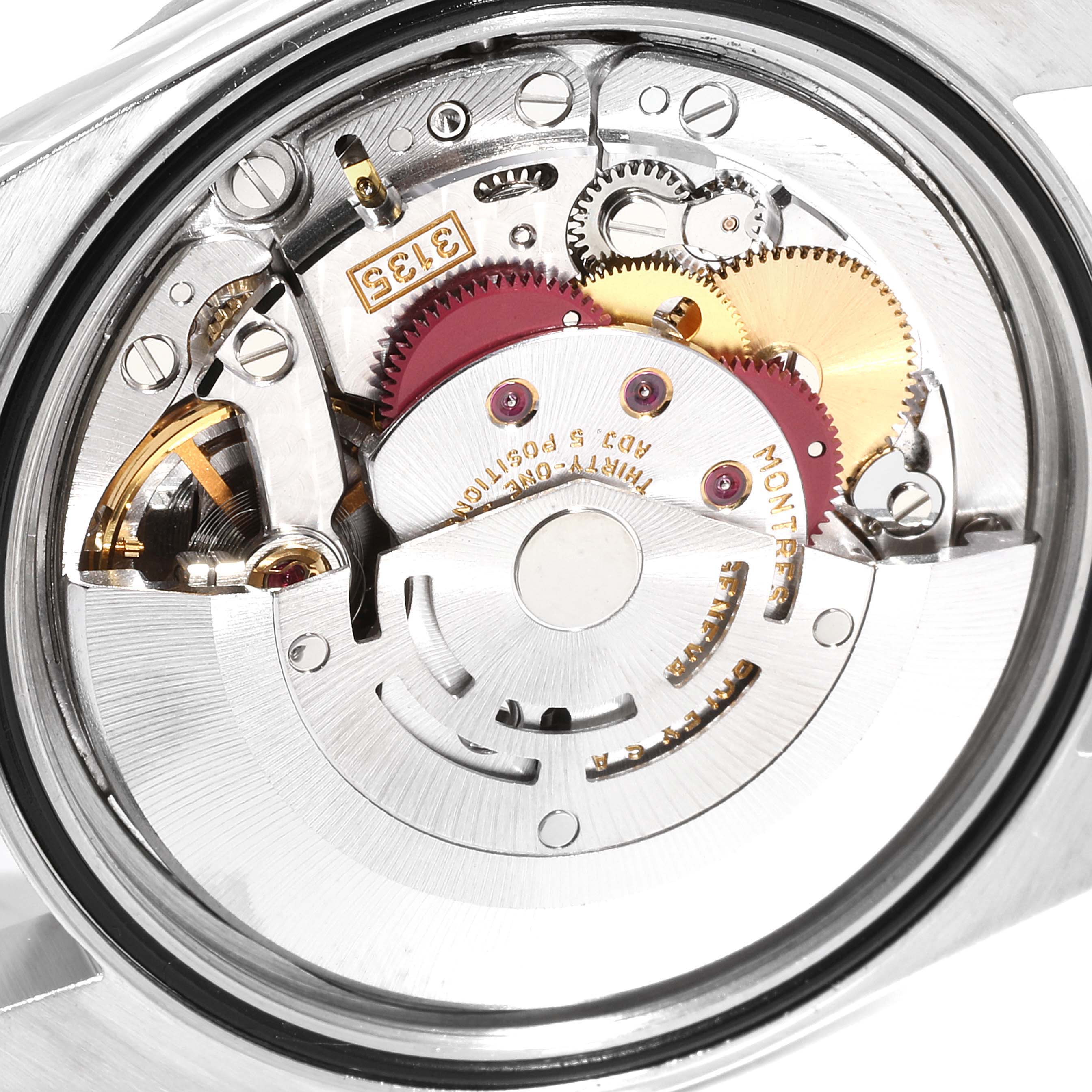 This image shows the internal mechanism of a Rolex Datejust 16220 Men's Stainless Steel Silver Dial 16220 Men's Stainless Steel Silver Dial watch at a close-up angle, highlighting gears and components.