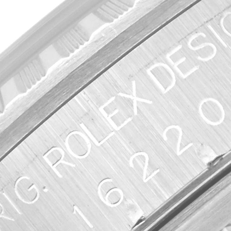 This image shows a close-up of the case and part of the bezel of a Rolex Datejust 16220 Men
s Stainless Steel Silver Dial 16220 Men
s Stainless Steel Silver Dial watch, highlighting the engraved text.