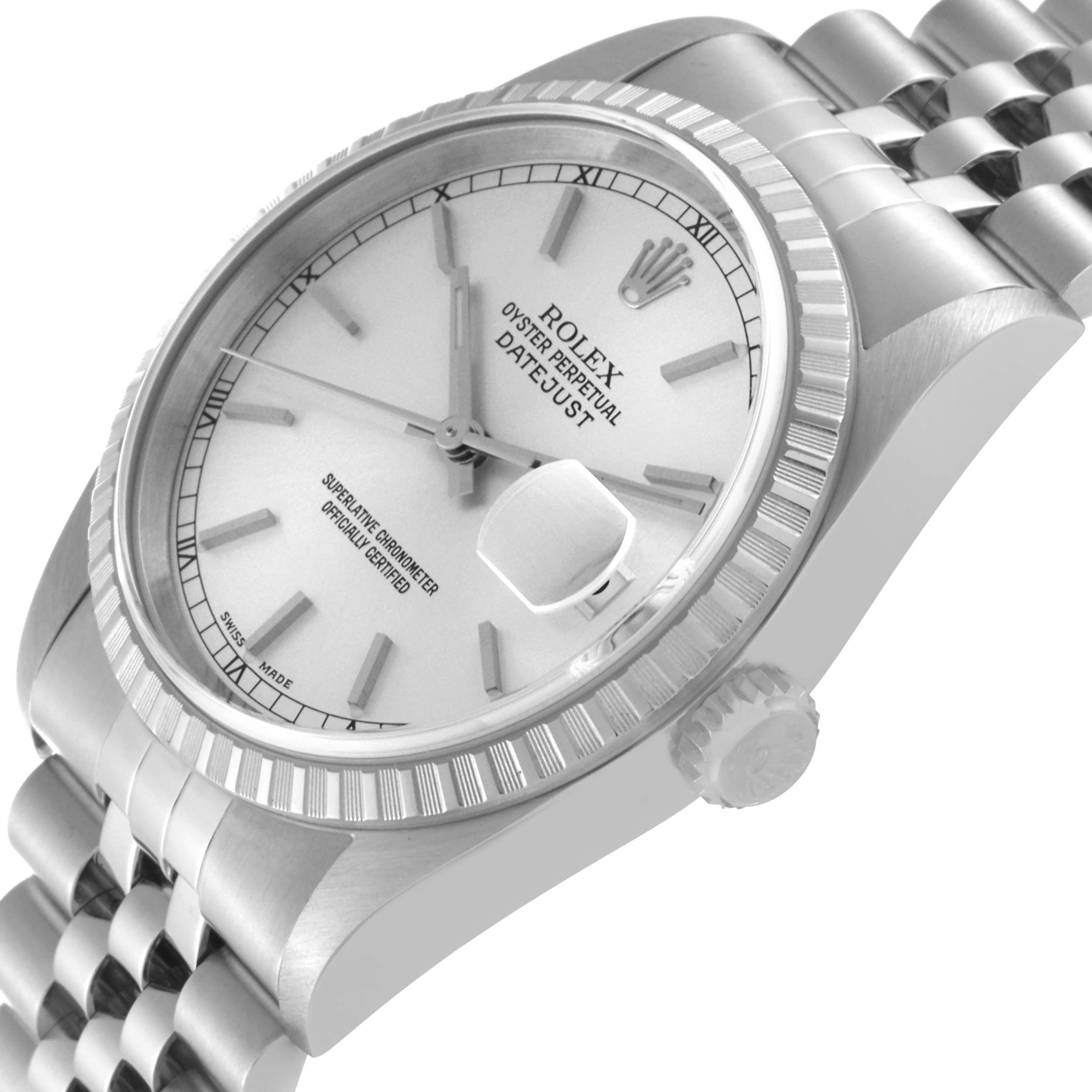 This image shows a Rolex Datejust 16220 Men
s Stainless Steel Silver Dial 16220 Men
s Stainless Steel Silver Dial watch at an angled close-up, highlighting its fluted bezel, crown, bracelet, and dial with date window.