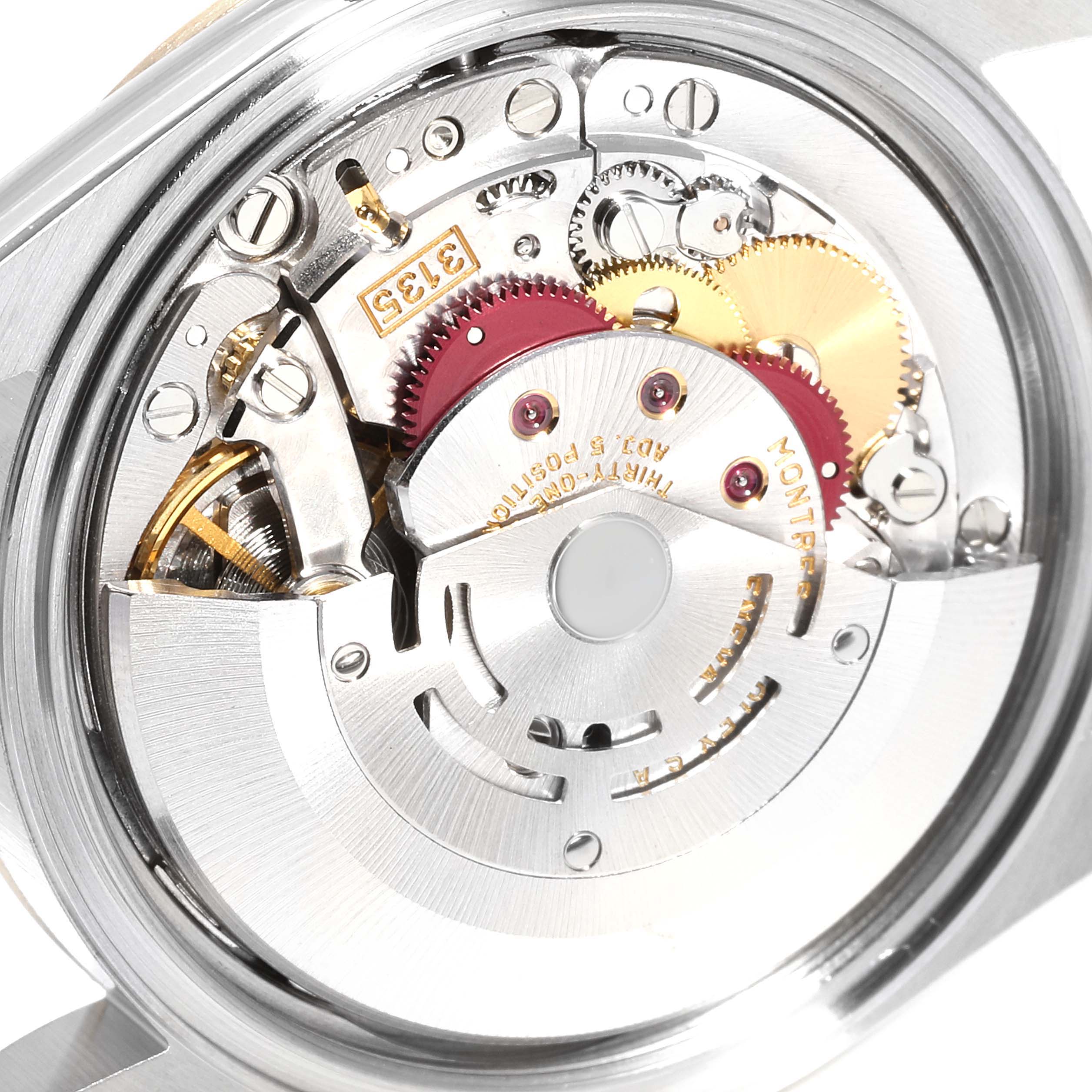 This image shows the movement and internal mechanism of a Rolex Datejust 16233 Men
s Steel and Gold (two tone) Champagne Dial 16233 Men
s Steel and Gold (two tone) Champagne Dial watch from the back.