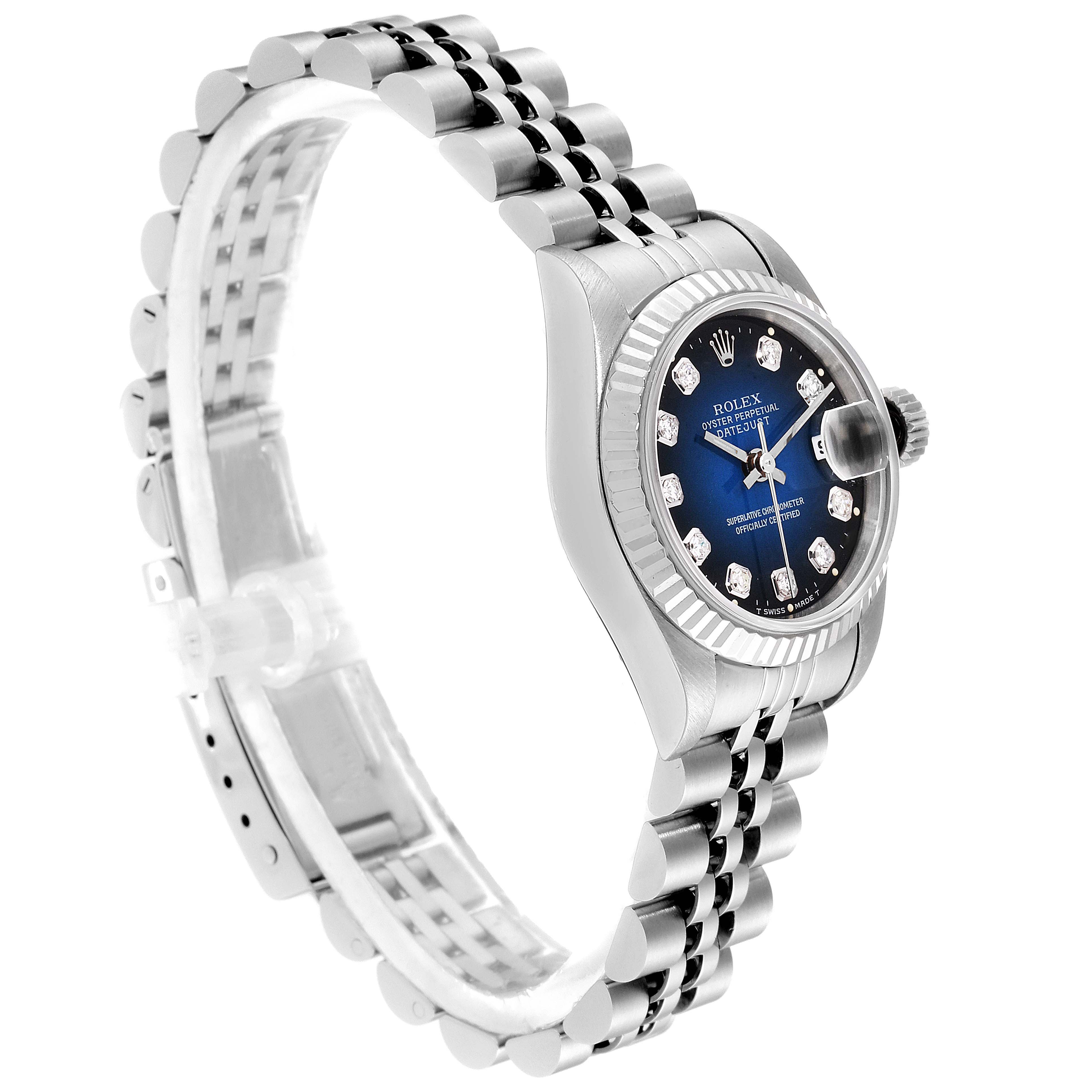 The image shows a Rolex Datejust 69174 Women's Stainless Steel Blue Dial 69174 Women's Stainless Steel Blue Dial watch from a side angle highlighting its dial, bezel, and bracelet.