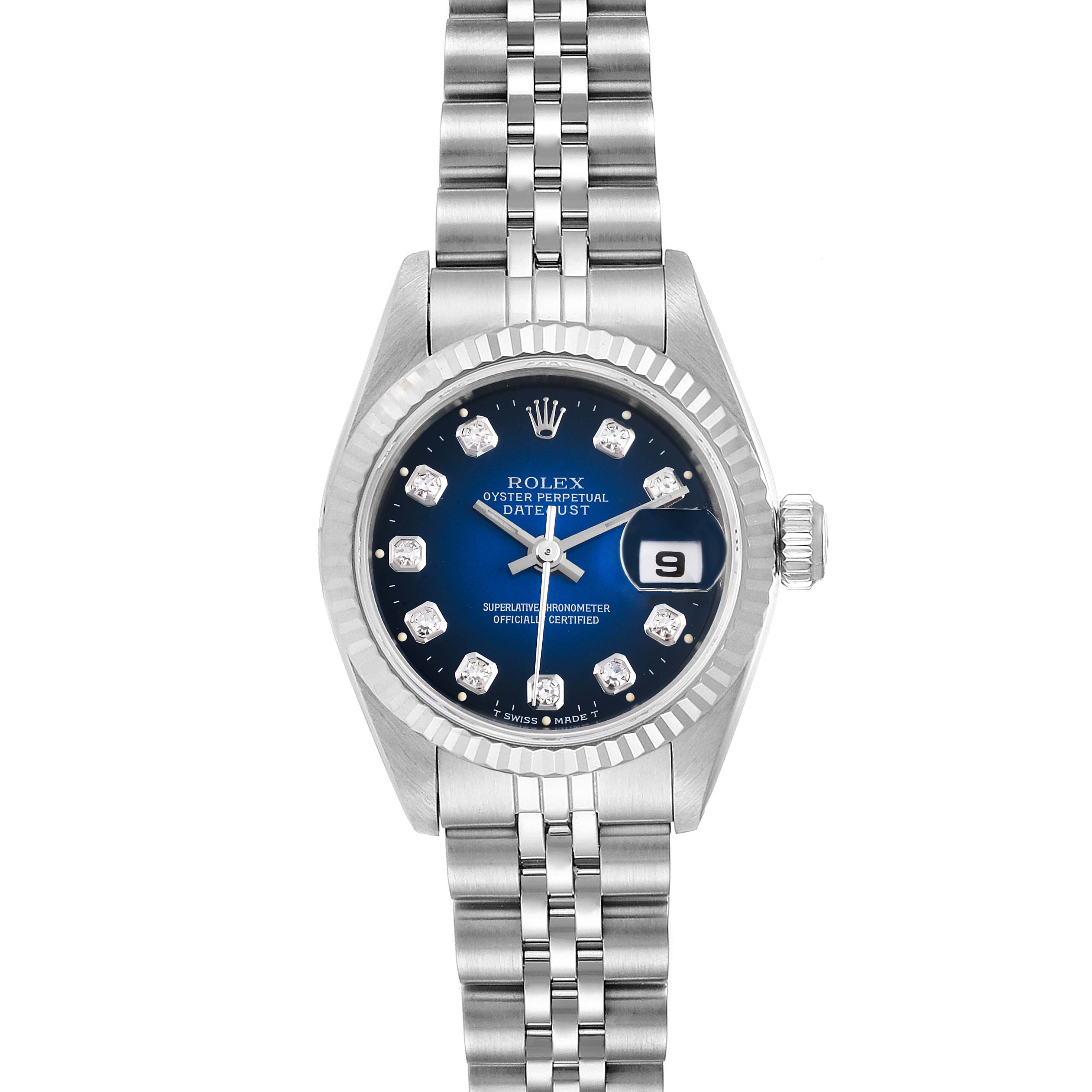 The image shows a front view of a Rolex Datejust 69174 Women's Stainless Steel Blue Dial 69174 Women's Stainless Steel Blue Dial, showcasing its blue dial, fluted bezel, and Jubilee bracelet.