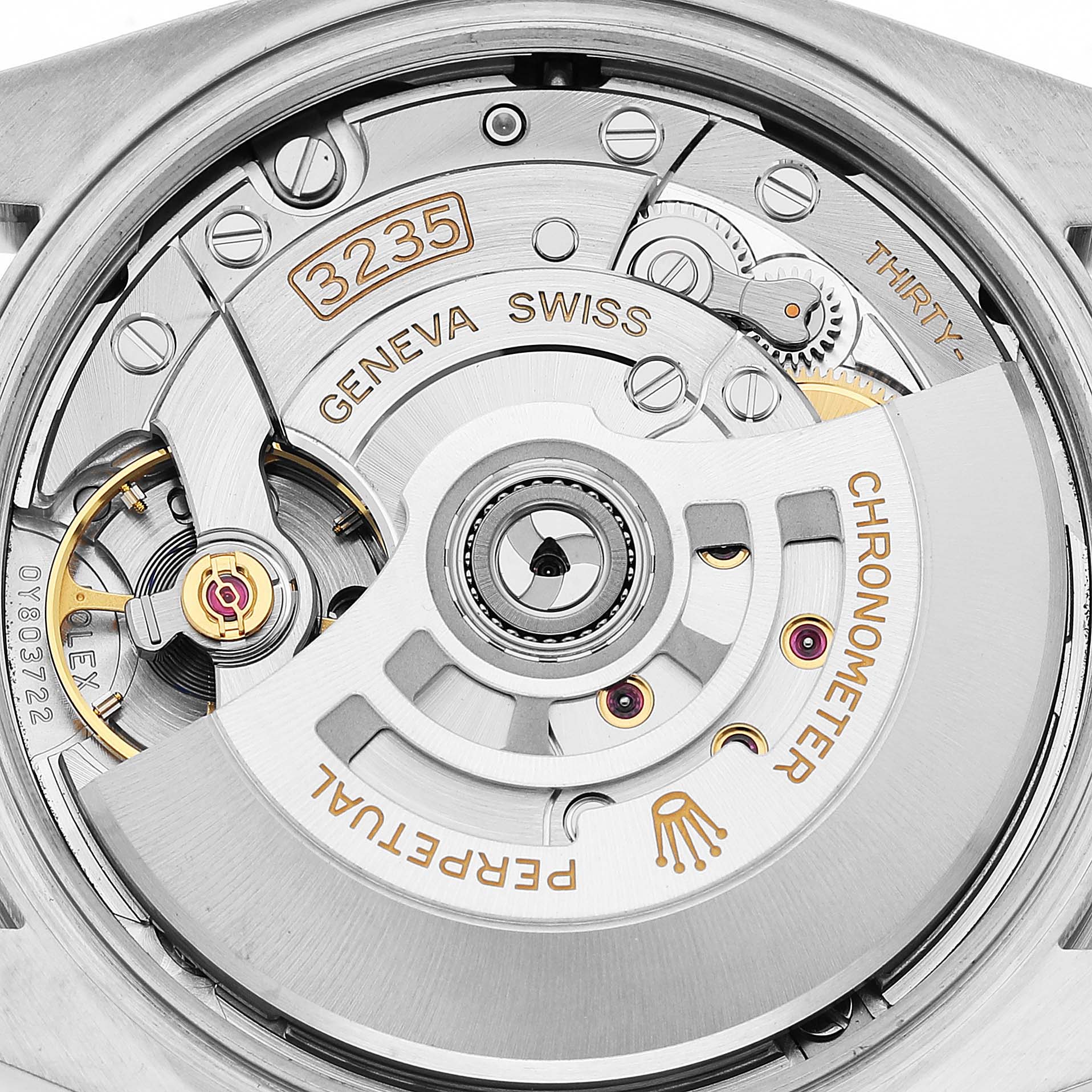 The image shows a detailed view of the Rolex Datejust 126234 Men's Stainless Steel Pink Dial's movement mechanism, highlighting the rotor and gears.