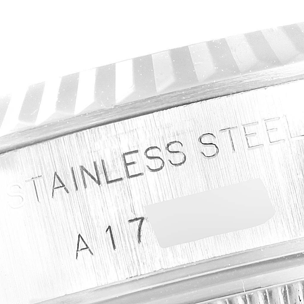 This image shows a close-up of the side of the stainless steel case on a Rolex Datejust 79174 Women
s Stainless Steel Silver Dial 79174 Women
s Stainless Steel Silver Dial watch.