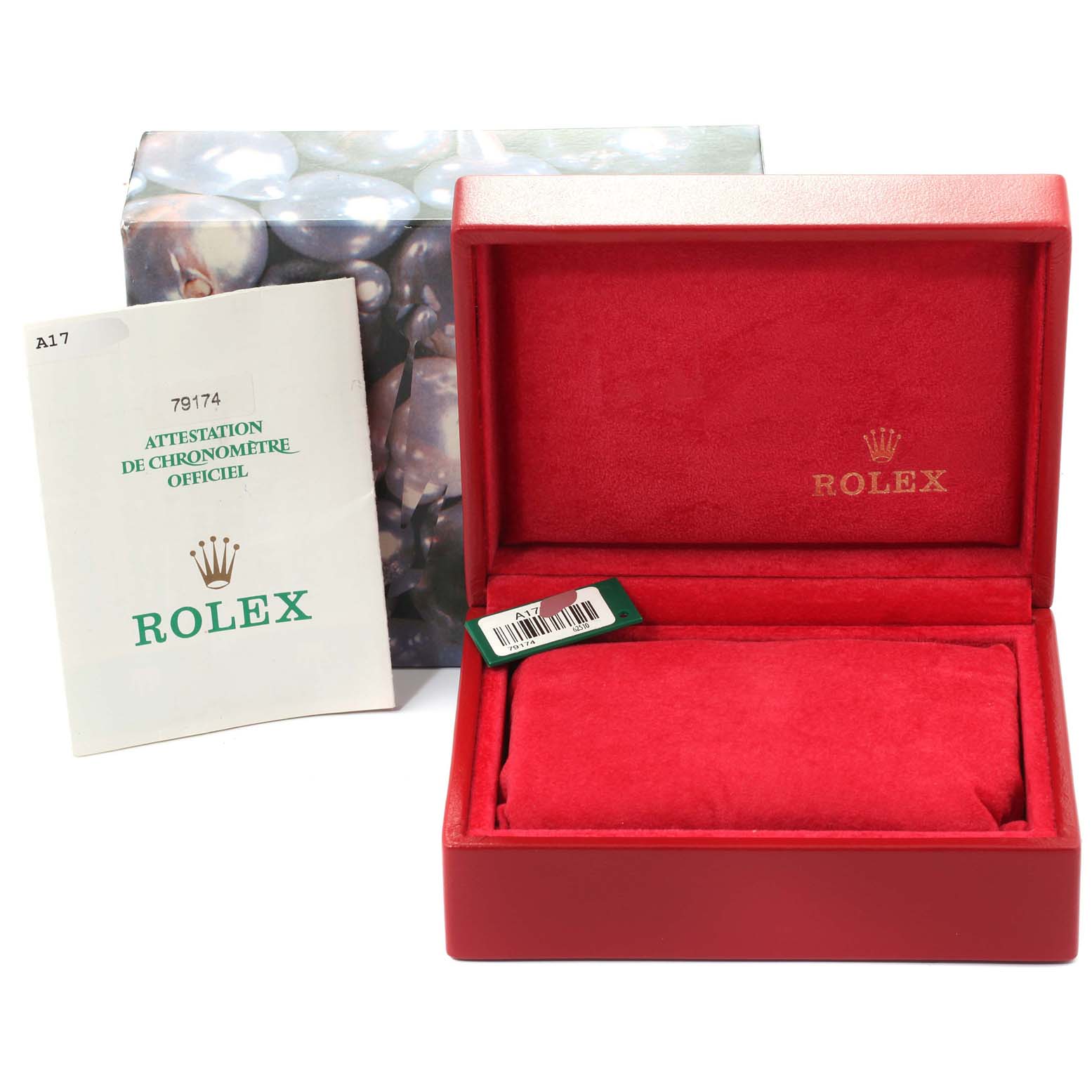 The image shows the packaging and accessories of a Rolex Datejust 79174 Women
s Stainless Steel Silver Dial 79174 Women
s Stainless Steel Silver Dial, including the box, cushion, and official chronometer certification.