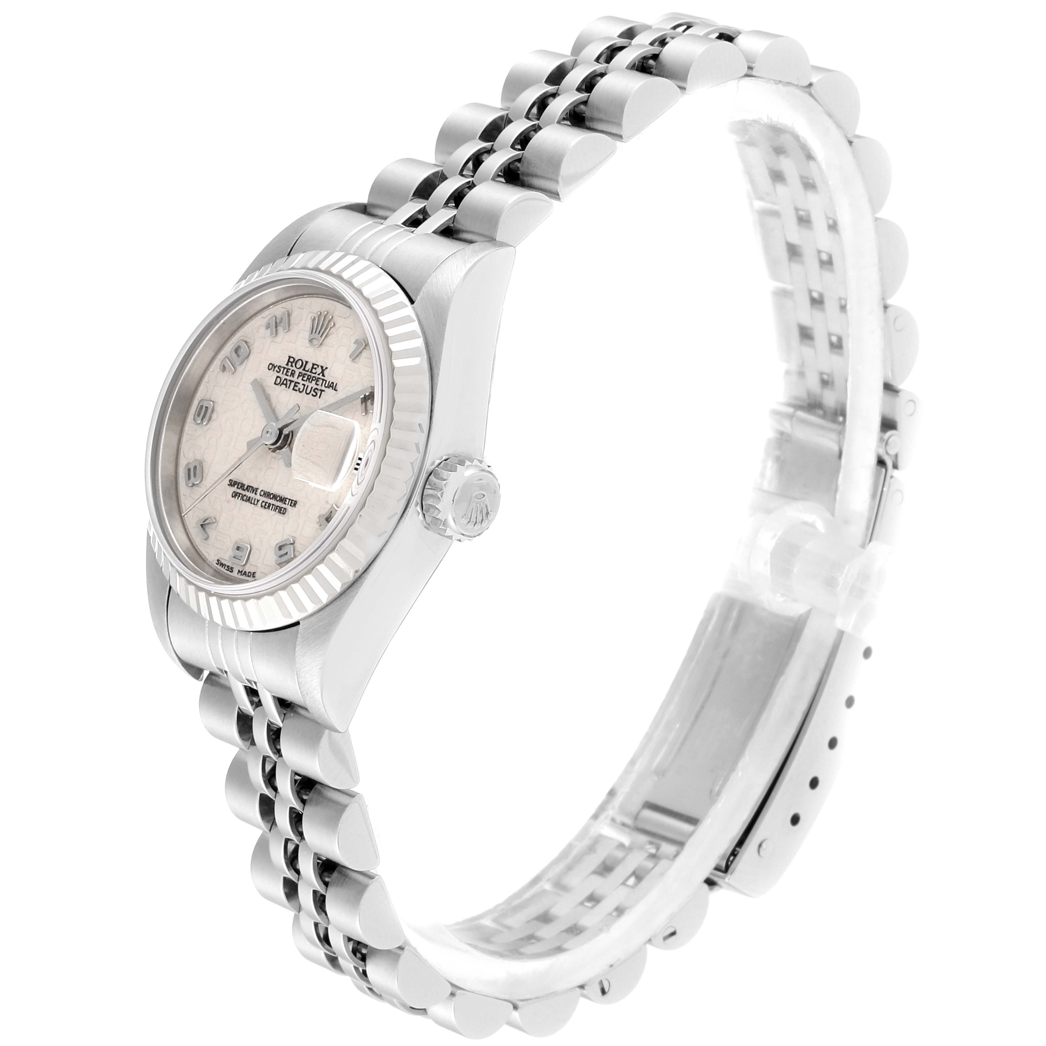 The image shows a Rolex Datejust 79174 Women
s Stainless Steel Silver Dial 79174 Women
s Stainless Steel Silver Dial watch at an angle focusing on the dial, crown, and jubilee bracelet.