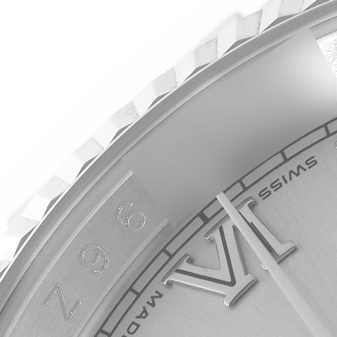 The image shows a close-up angle of the dial and bezel of a Rolex Datejust 116234 Men's Stainless Steel Silver Dial 116234 Men's Stainless Steel Silver Dial watch, highlighting the Roman numeral "VI" and “SWISS” text.