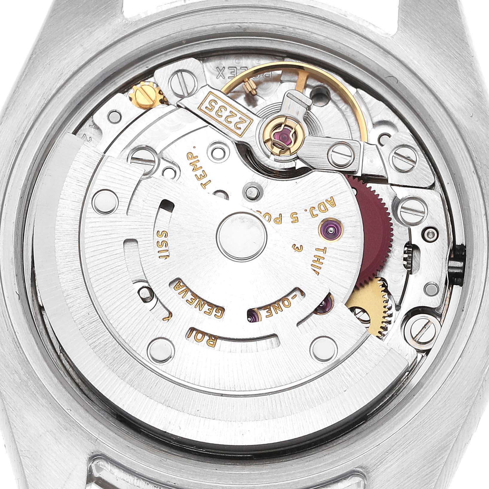The image shows a close-up of the movement mechanism of a Rolex Datejust 179174 Women
s Stainless Steel Silver Dial 179174 Women
s Stainless Steel Silver Dial watch, highlighting its intricate internal components.