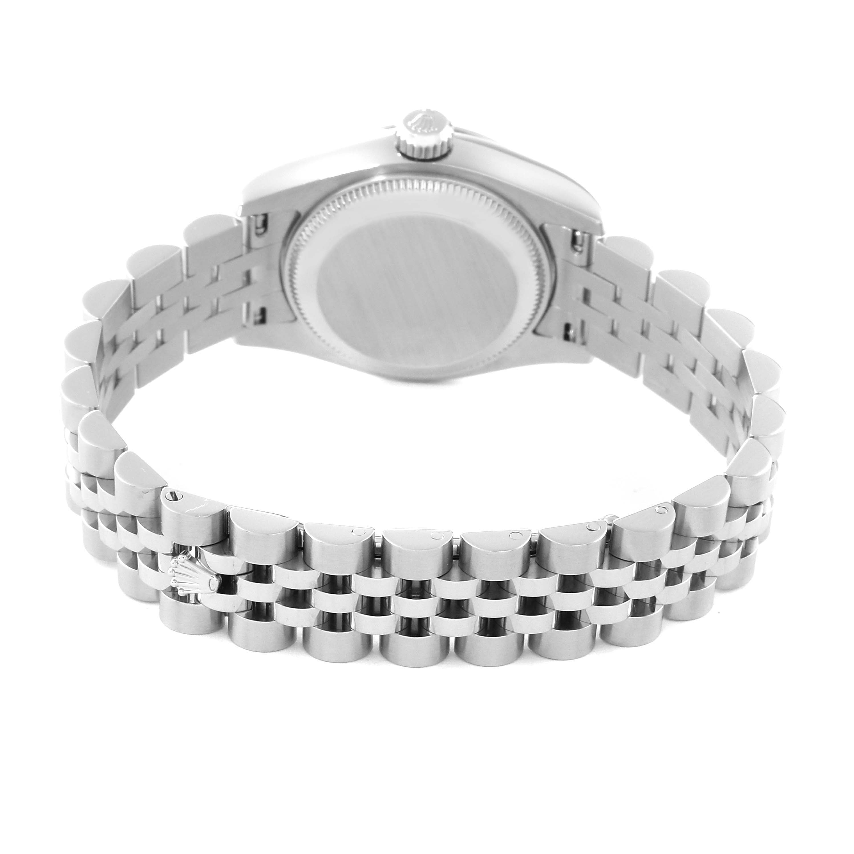 The image shows the back of the Rolex Datejust 179174 Women
s Stainless Steel Silver Dial 179174 Women
s Stainless Steel Silver Dial watch, highlighting its case, crown, and jubilee bracelet.