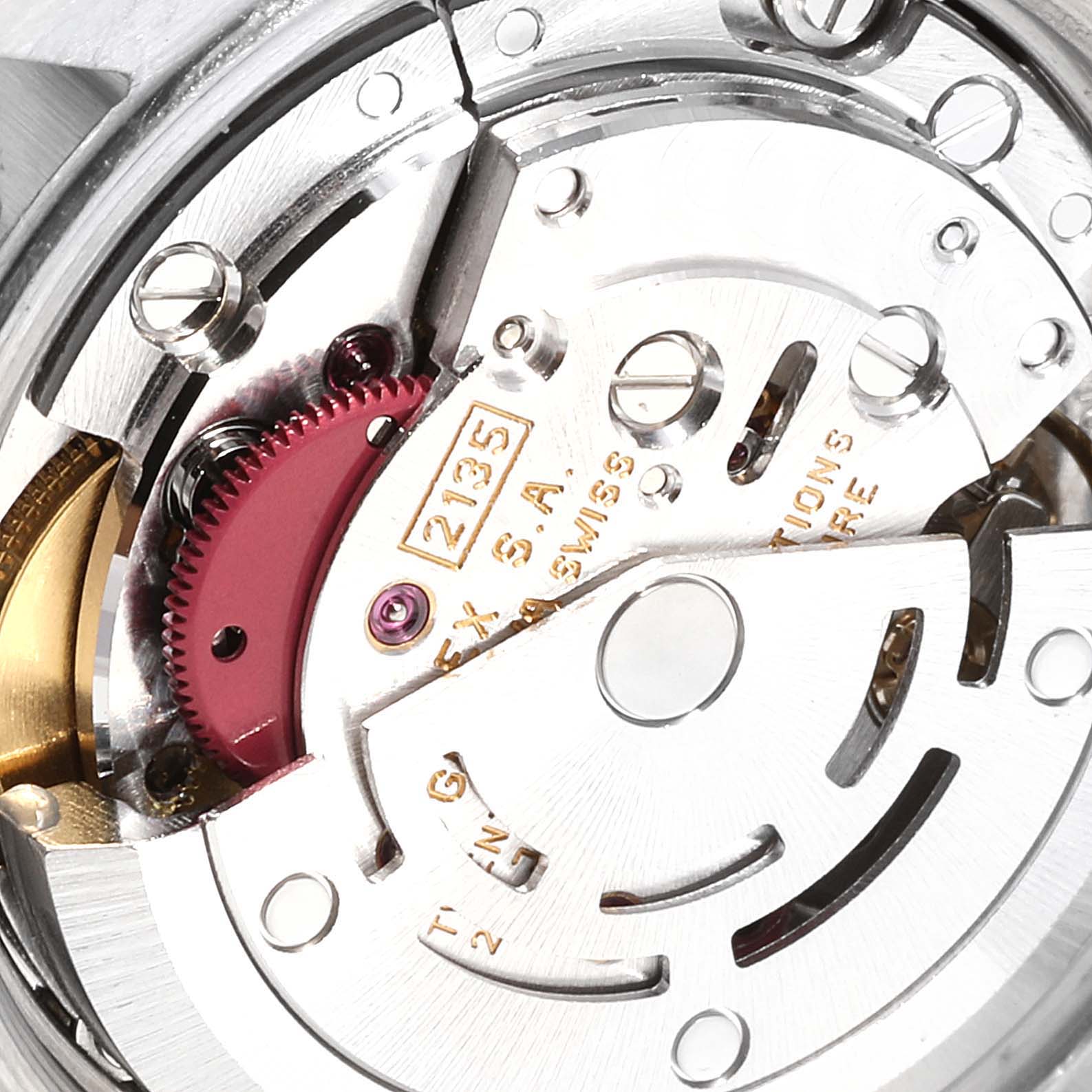 The image shows a close-up view of the movement and internal components of a Rolex Datejust 69173 Women
s Steel and Gold (two tone) Black Dial 69173 Women
s Steel and Gold (two tone) Black Dial watch.