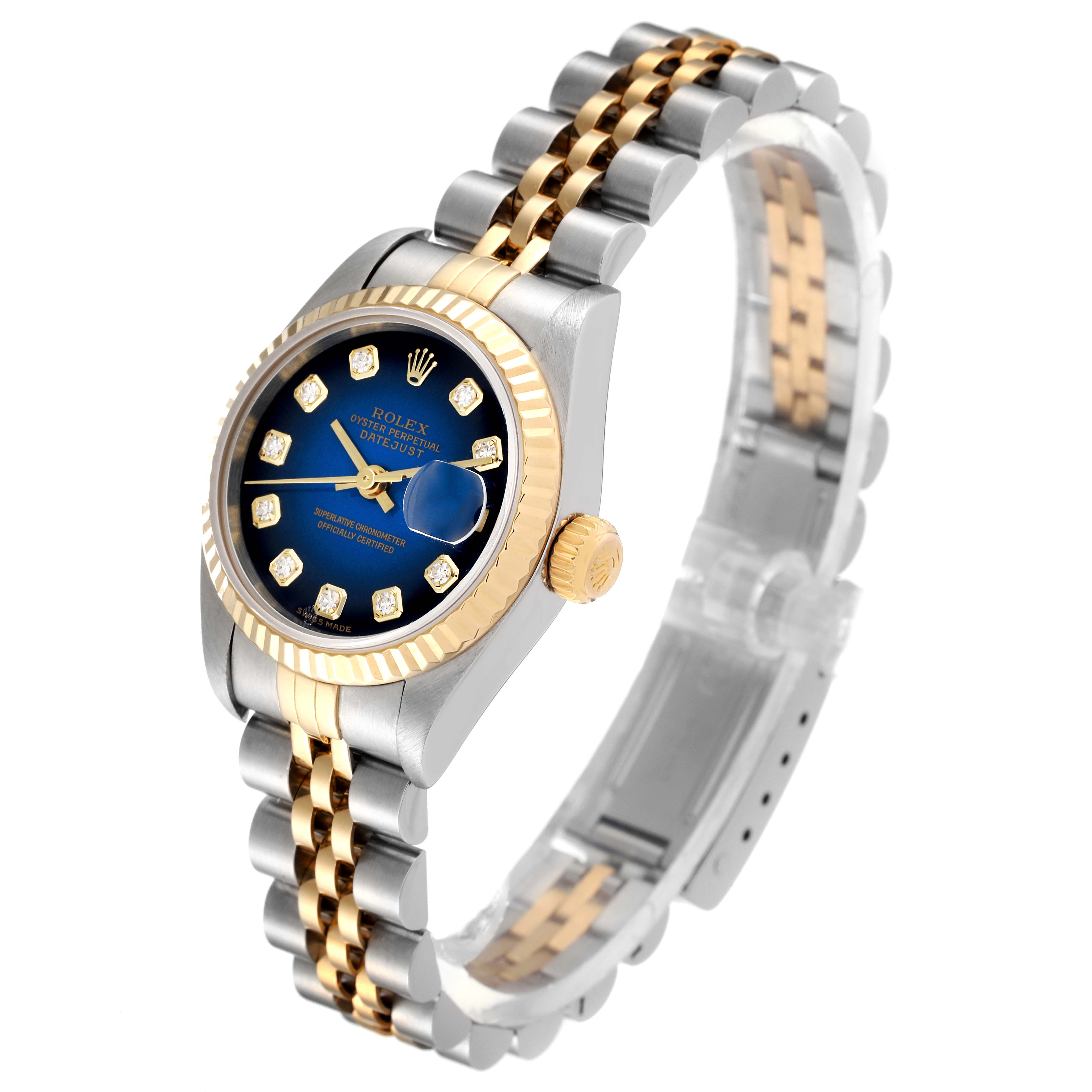 The image shows a Rolex Datejust 79173 Women
s Steel and Gold (two tone) Blue Dial 79173 Women
s Steel and Gold (two tone) Blue Dial watch at a three-quarter angle, highlighting its dial, bezel, and bracelet.