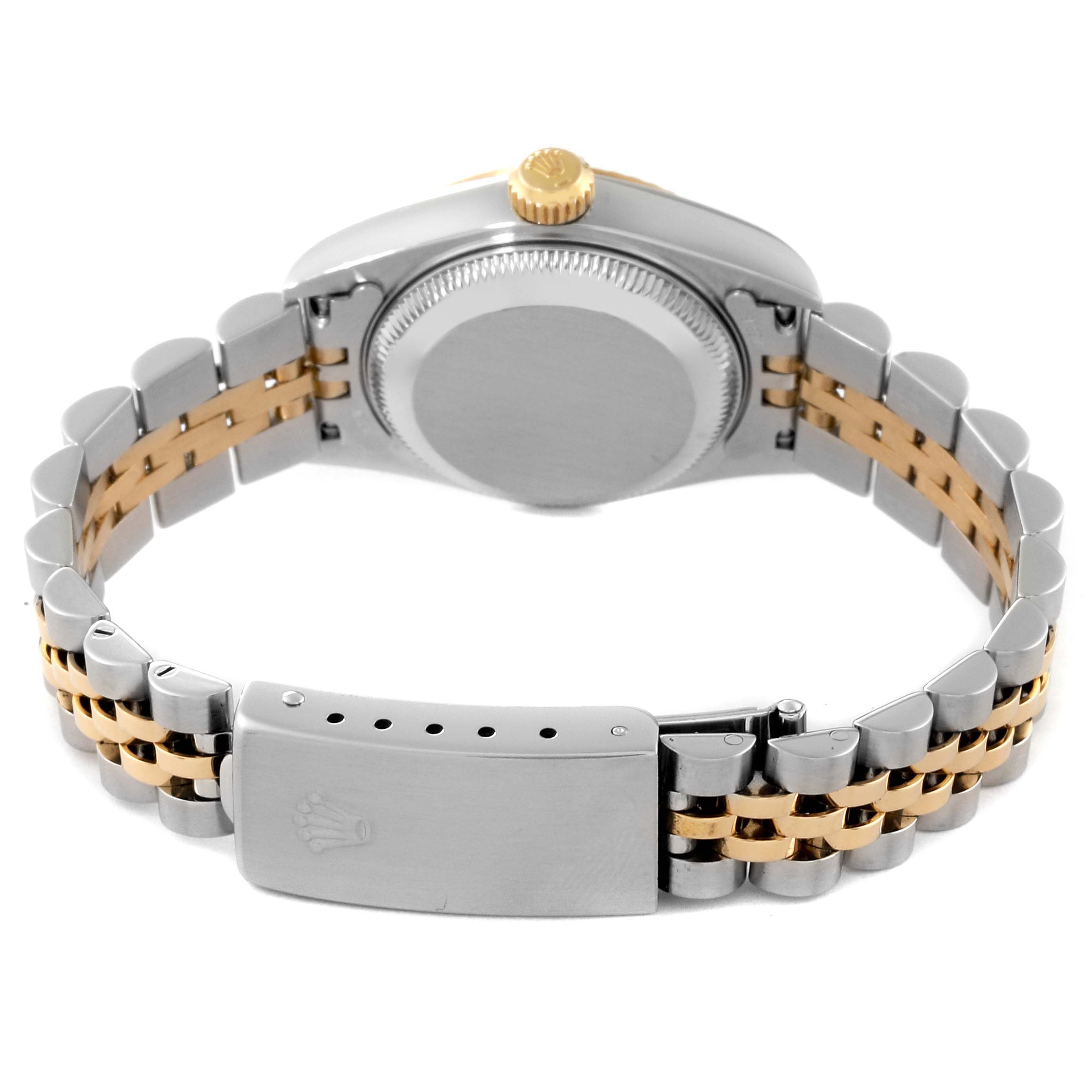 This image shows the back of a Rolex Datejust 79173 Women's Steel and Gold (two tone) Champagne Dial 79173 Women's Steel and Gold (two tone) Champagne Dial watch, highlighting the case back, crown, and two-tone bracelet with clasp.