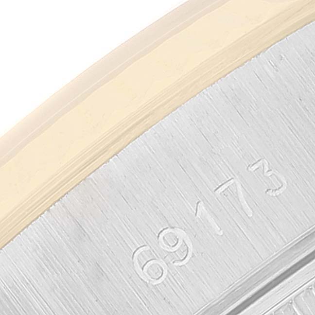 This image shows a close-up of the Rolex Datejust 69173 Women's Steel and Gold (two tone) Champagne Dial 69173 Women's Steel and Gold (two tone) Champagne Dial's case edge, displaying the model number 69173.