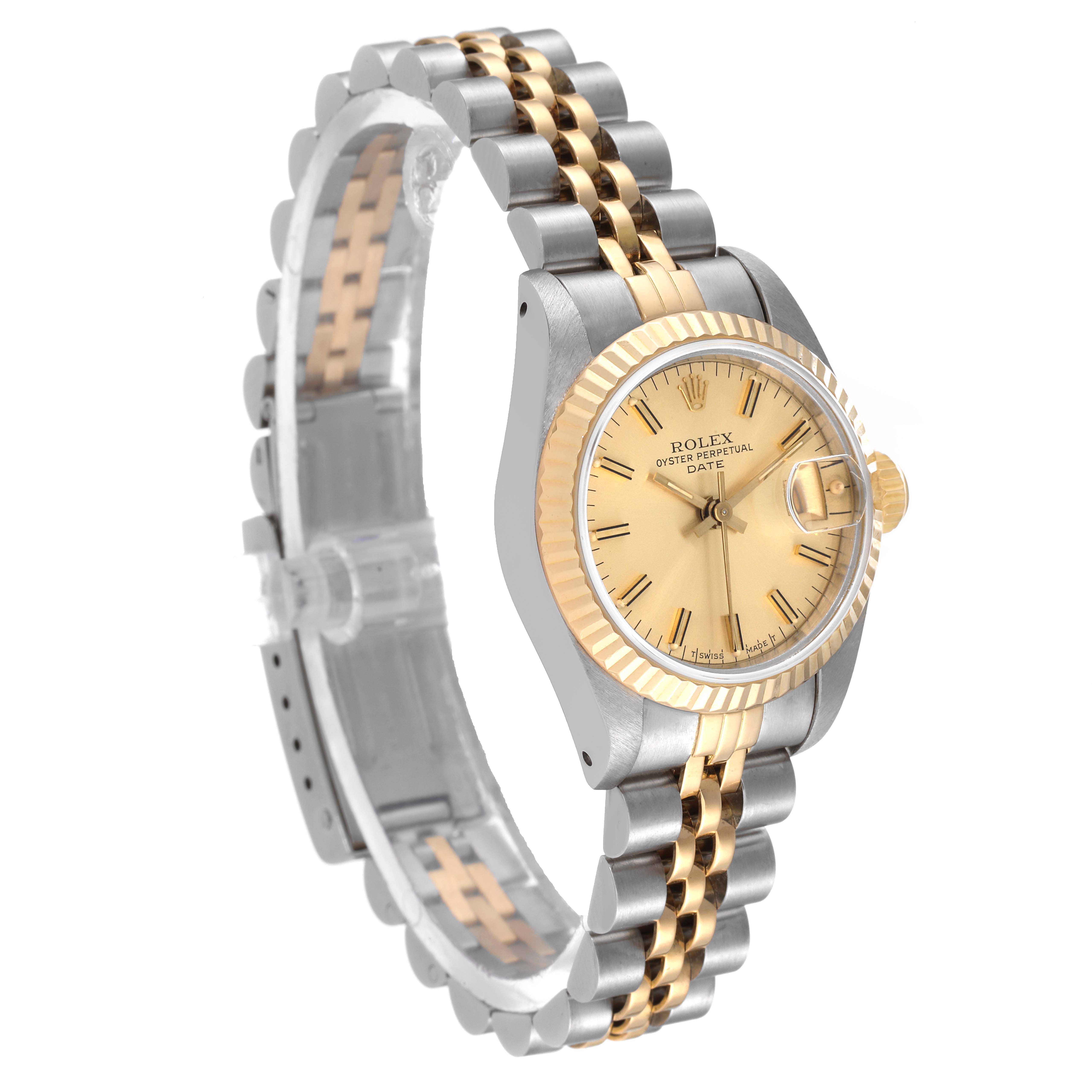This Rolex Datejust 69173 Women's Steel and Gold (two tone) Champagne Dial 69173 Women's Steel and Gold (two tone) Champagne Dial watch is shown from a front angle, highlighting its face, bezel, and two-tone bracelet.