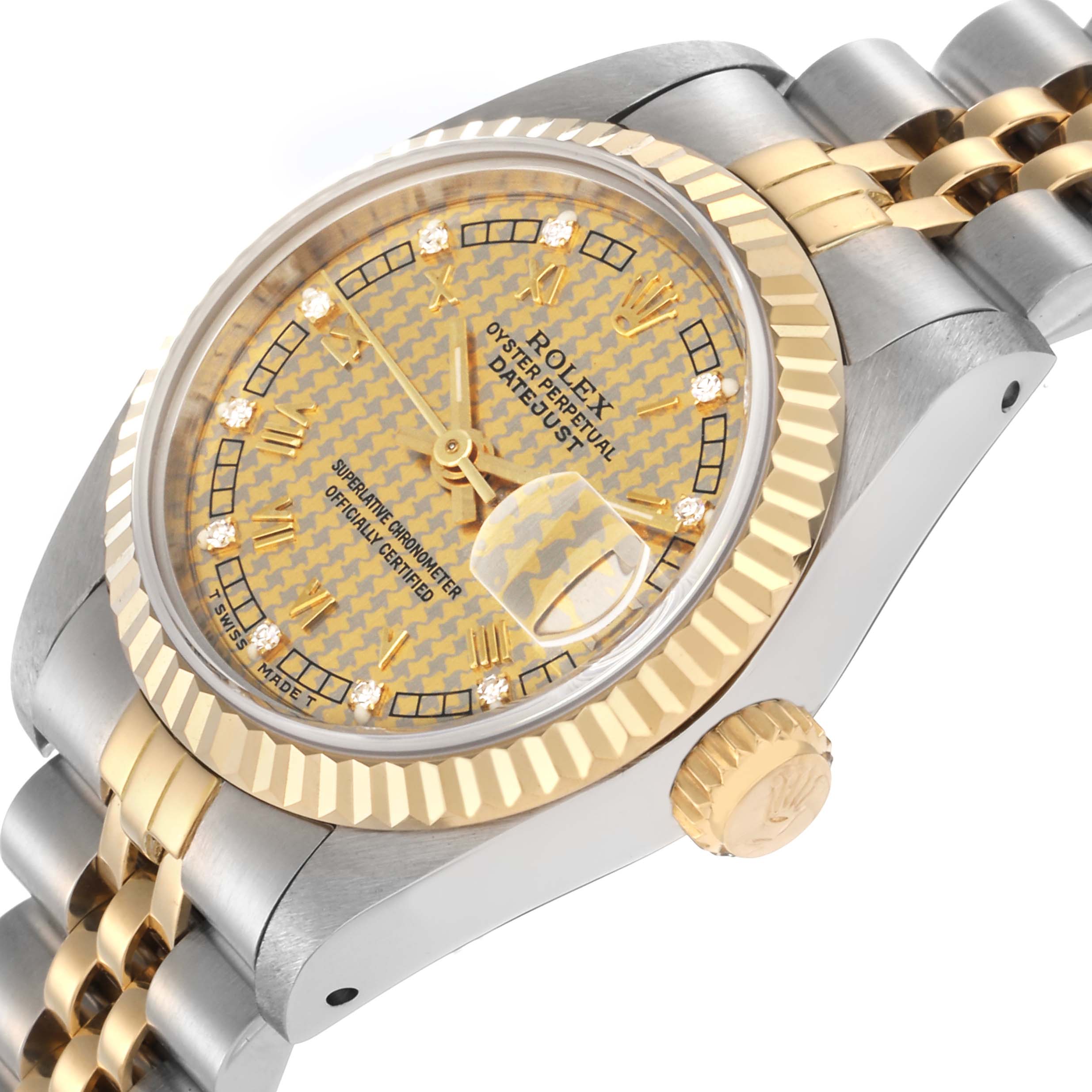 The image shows the Rolex Datejust model 69173 from a side angle, highlighting the bezel, crown, and part of the dial and bracelet.