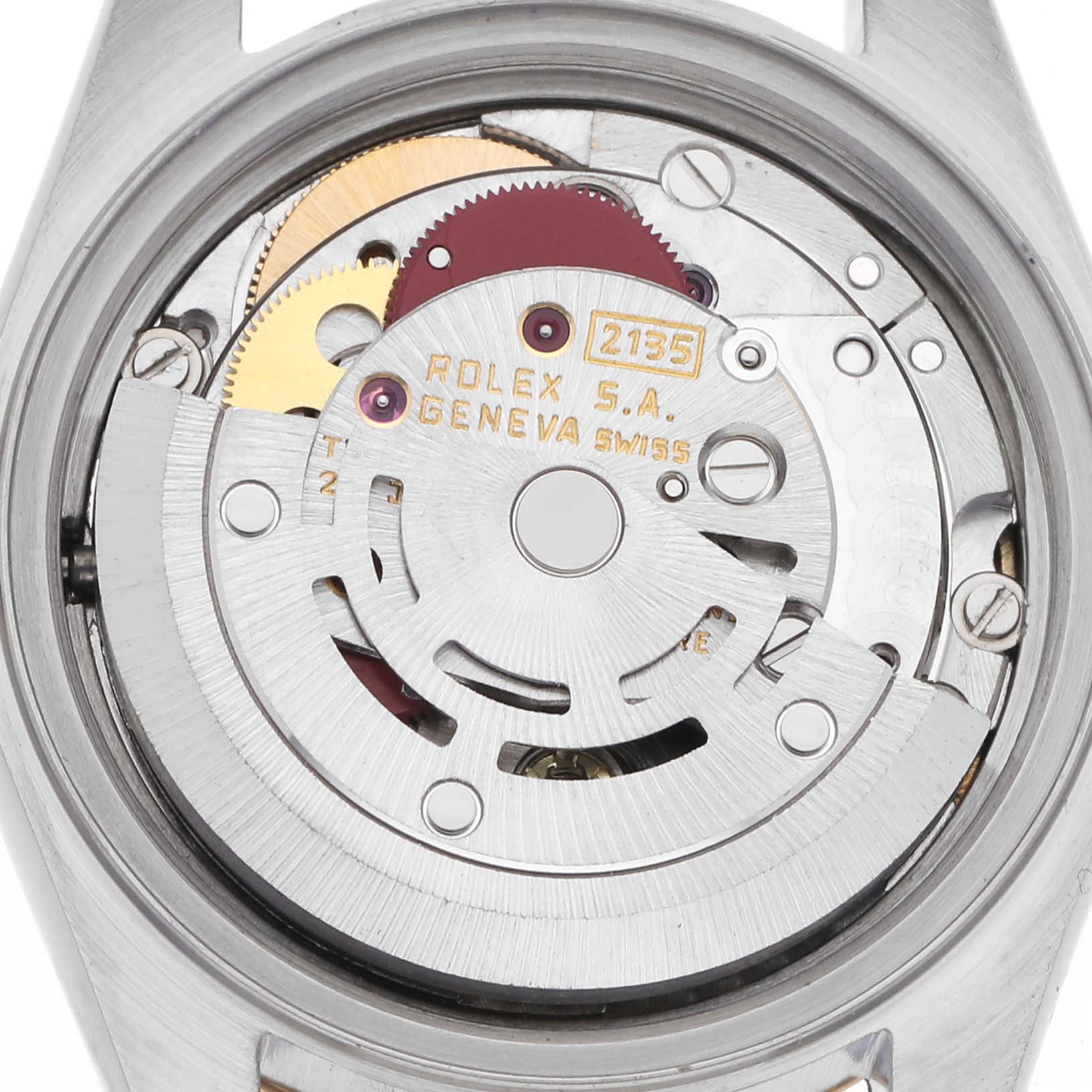 This image shows a close-up of the movement mechanism of a Rolex Datejust model 69173, focusing on the intricate gears and components inside the watch case.