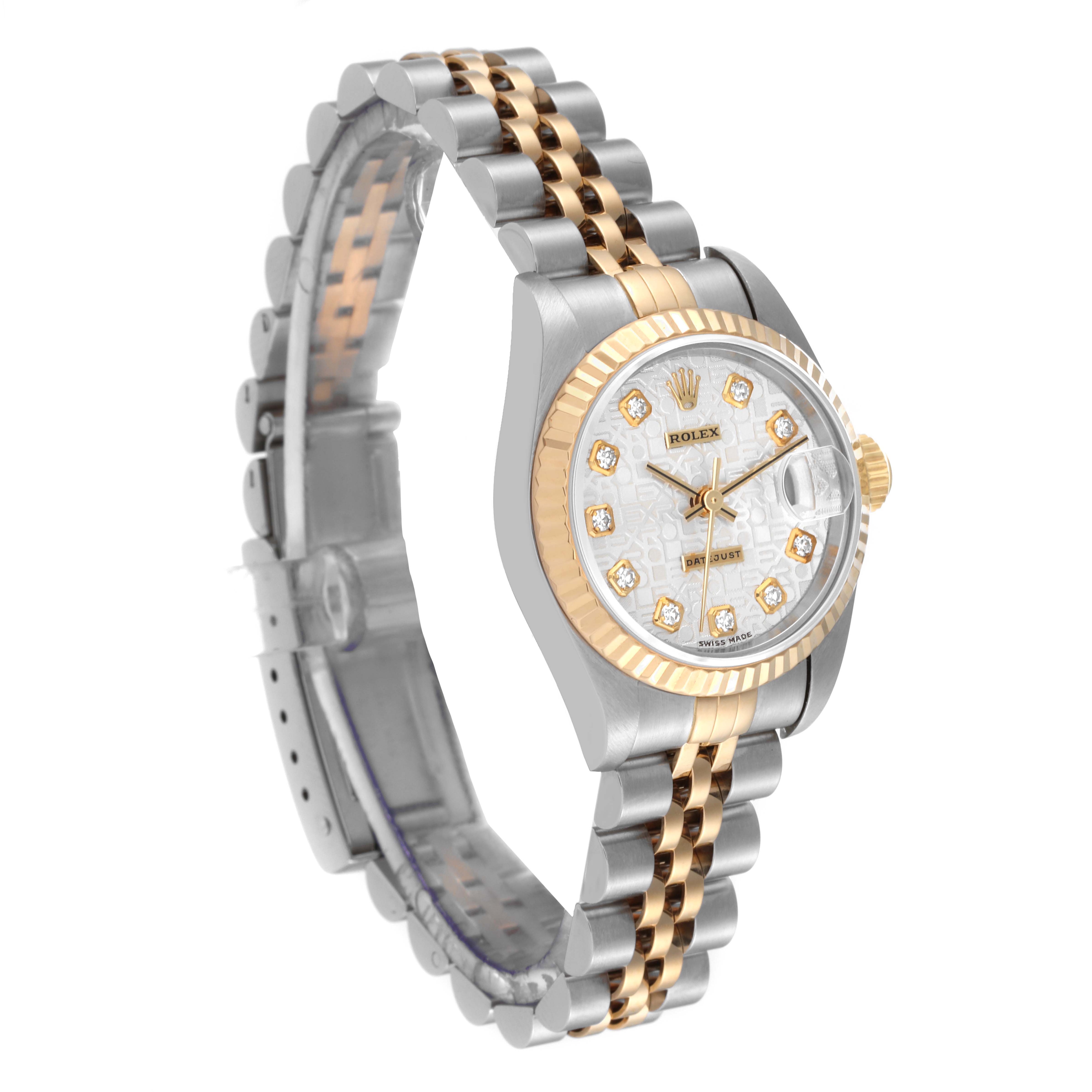 This image shows a Rolex Datejust 79173 Women's Steel and Gold (two tone) Silver Dial 79173 Women's Steel and Gold (two tone) Silver Dial watch angled to display the face, bezel, and part of the bracelet.