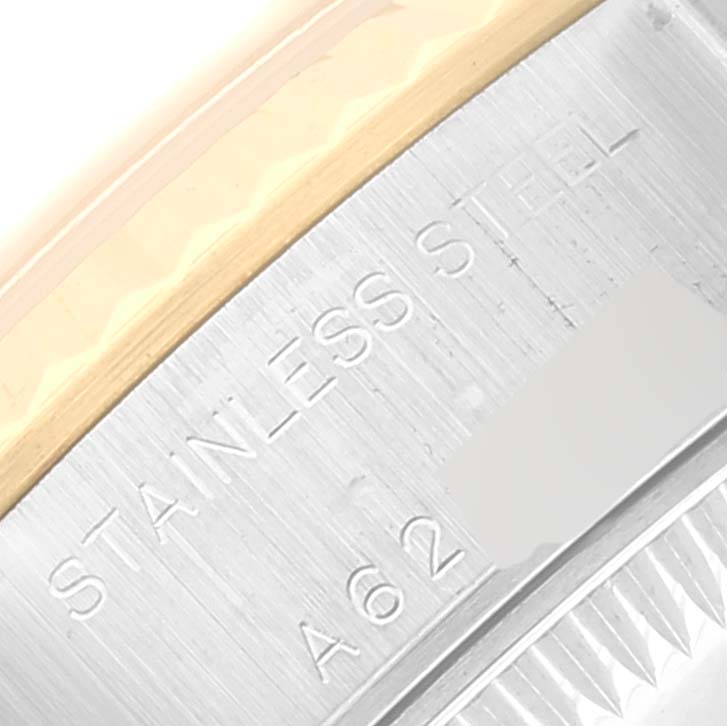 This image shows the side engraving on a Rolex Datejust 79173 Women's Steel and Gold (two tone) Silver Dial 79173 Women's Steel and Gold (two tone) Silver Dial watch, displaying the "STAINLESS STEEL" inscription.
