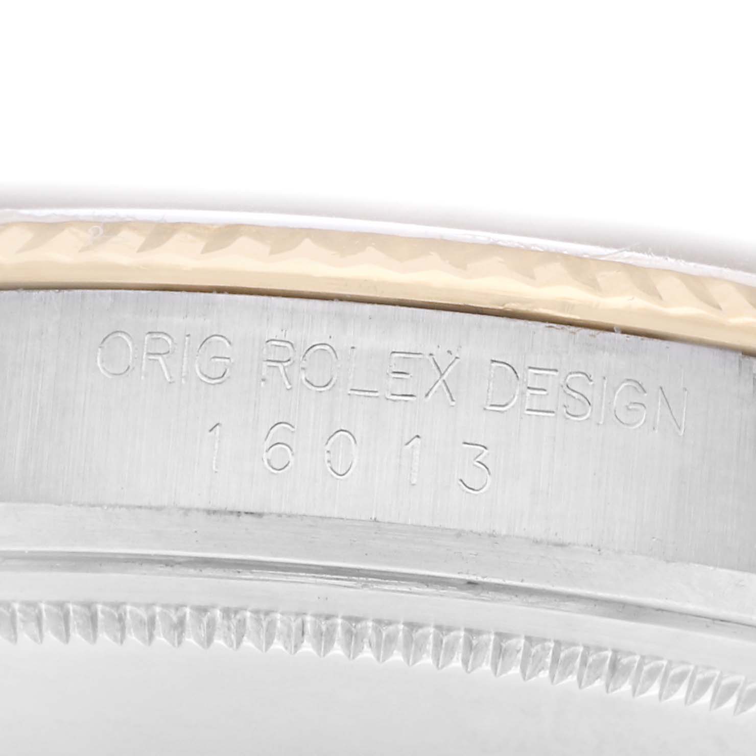 The image shows the side view of the Rolex Datejust model 16013, highlighting the “ORIG ROLEX DESIGN” engraving on the case edge.