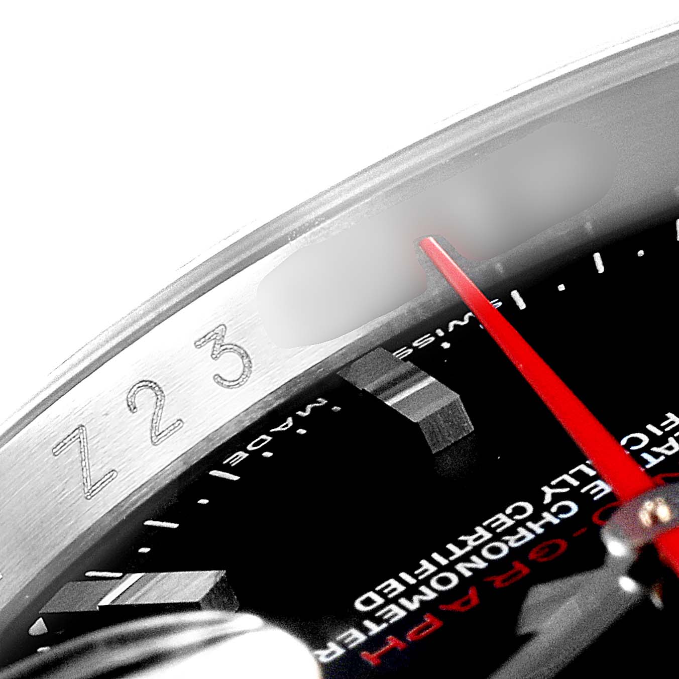 The image shows a close-up of the Turn-o-Graph Rolex
s bezel, red second hand, and part of the dial with markings.