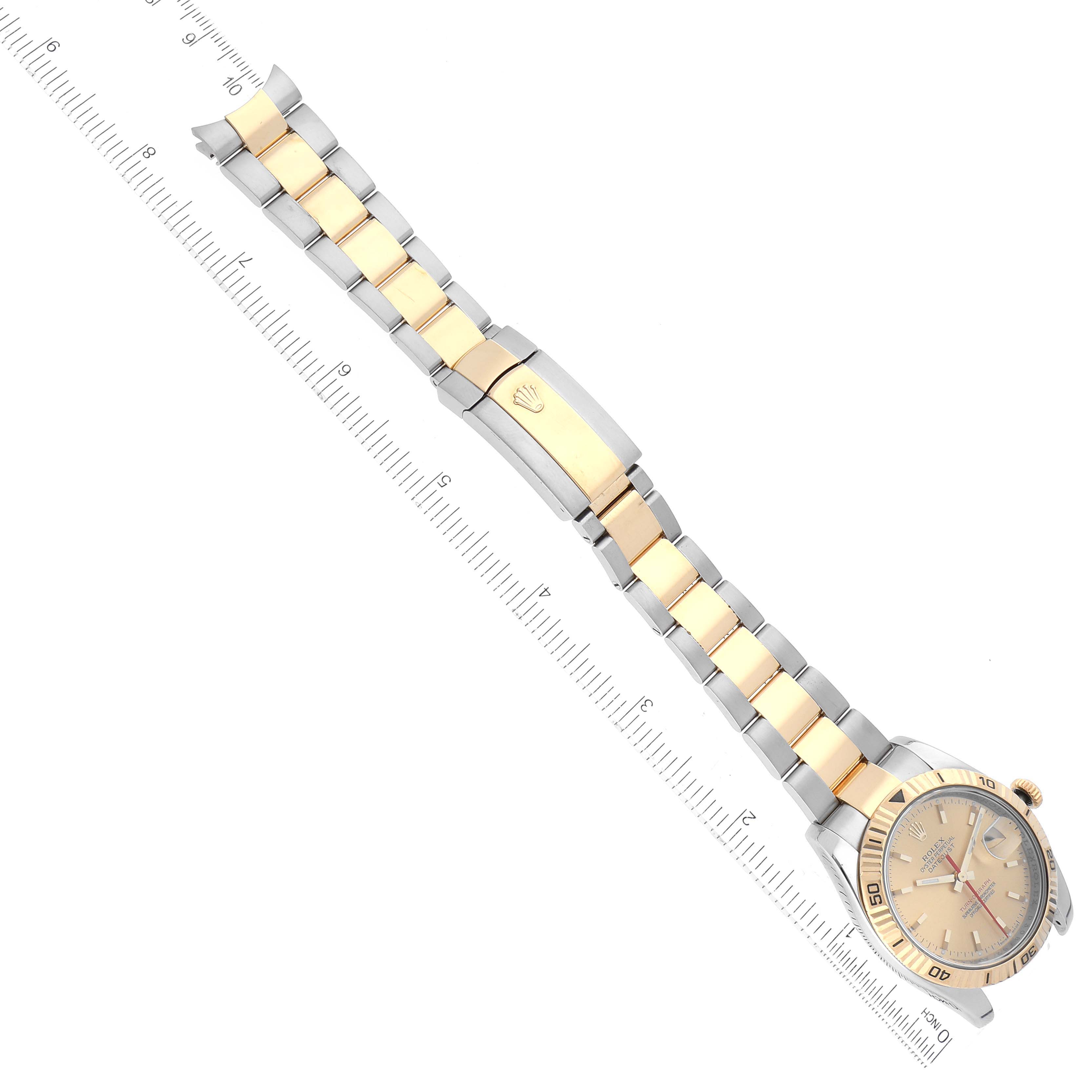 The Rolex Turn-o-Graph 116263 Men's Steel and Gold (two tone) Champagne Dial watch is displayed horizontally, showcasing the face, bezel, bracelet, and clasp.