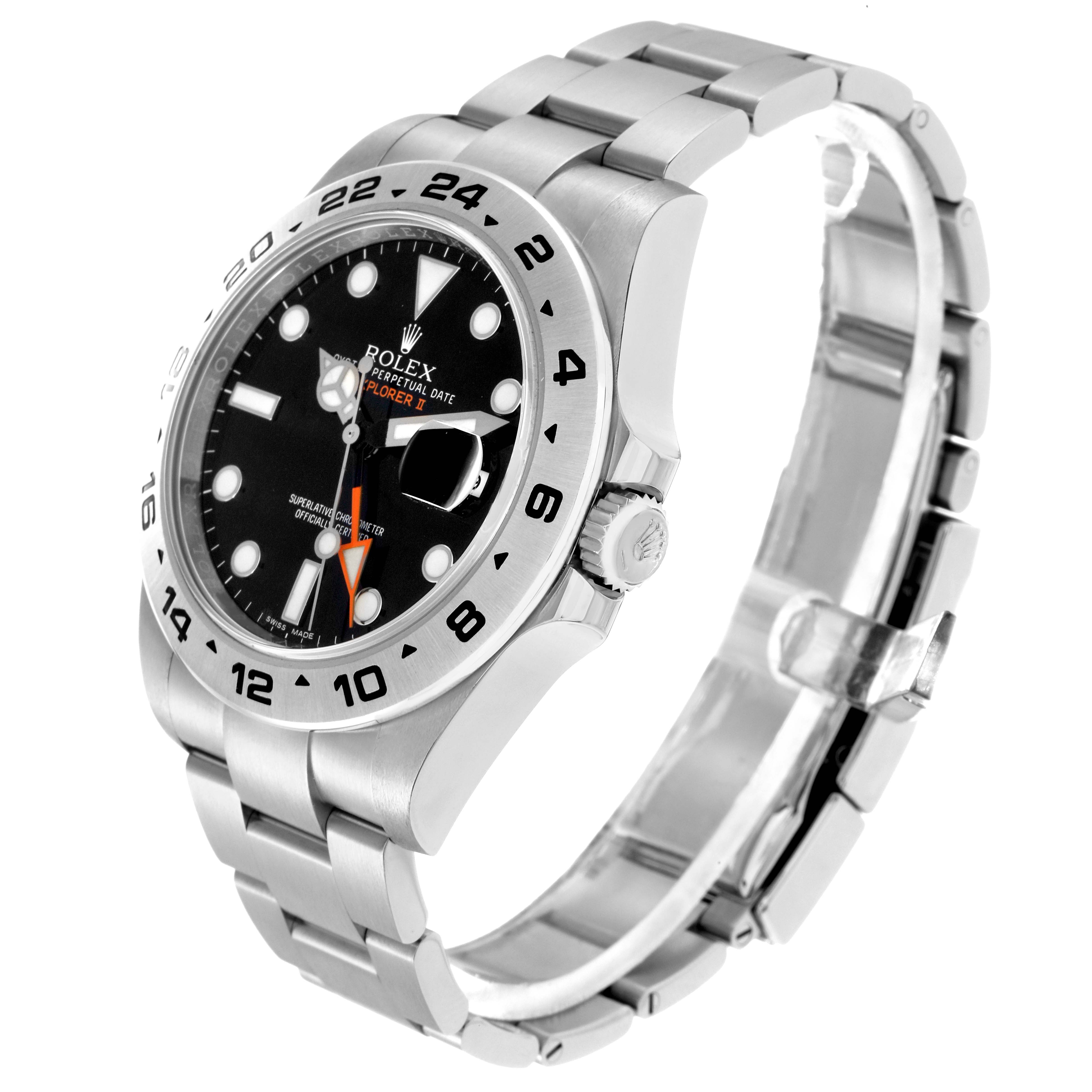 The Rolex Explorer model 216570 watch is shown at a three-quarter angle, highlighting the face, bezel, crown, and partially open bracelet.