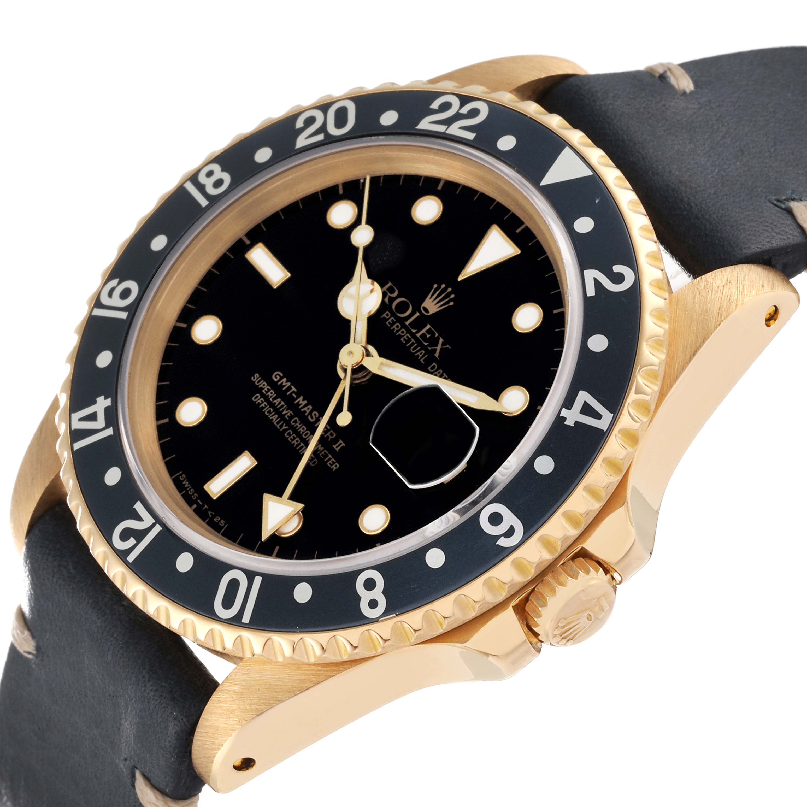 This image shows a Rolex GMT-Master 16718 Men's Yellow Gold Black Dial 16718 Men's Yellow Gold Black Dial watch at an angle highlighting the face, gold casing, black bezel, and leather strap.