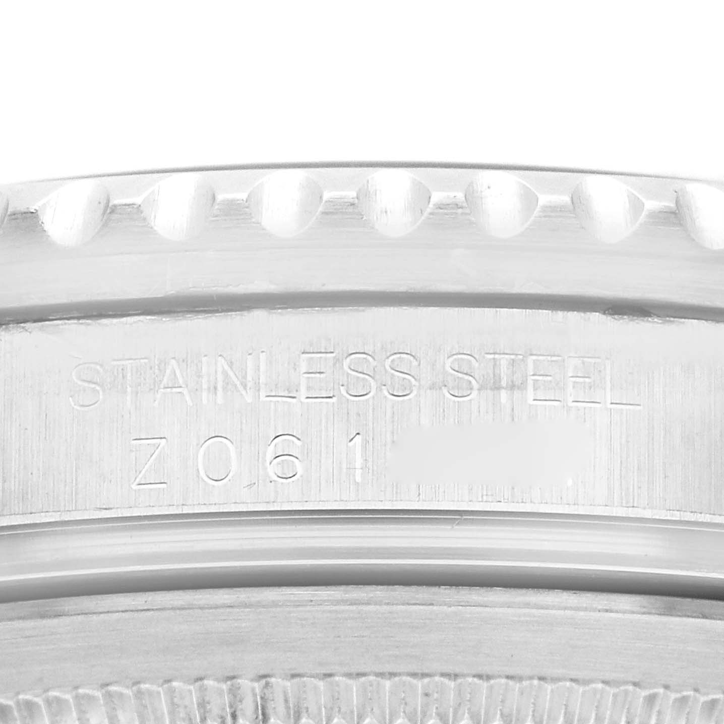 This close-up image shows the engraved text on the stainless steel case back of a Rolex GMT-Master 16710 Men
s Stainless Steel Black Dial 16710 Men
s Stainless Steel Black Dial watch model.