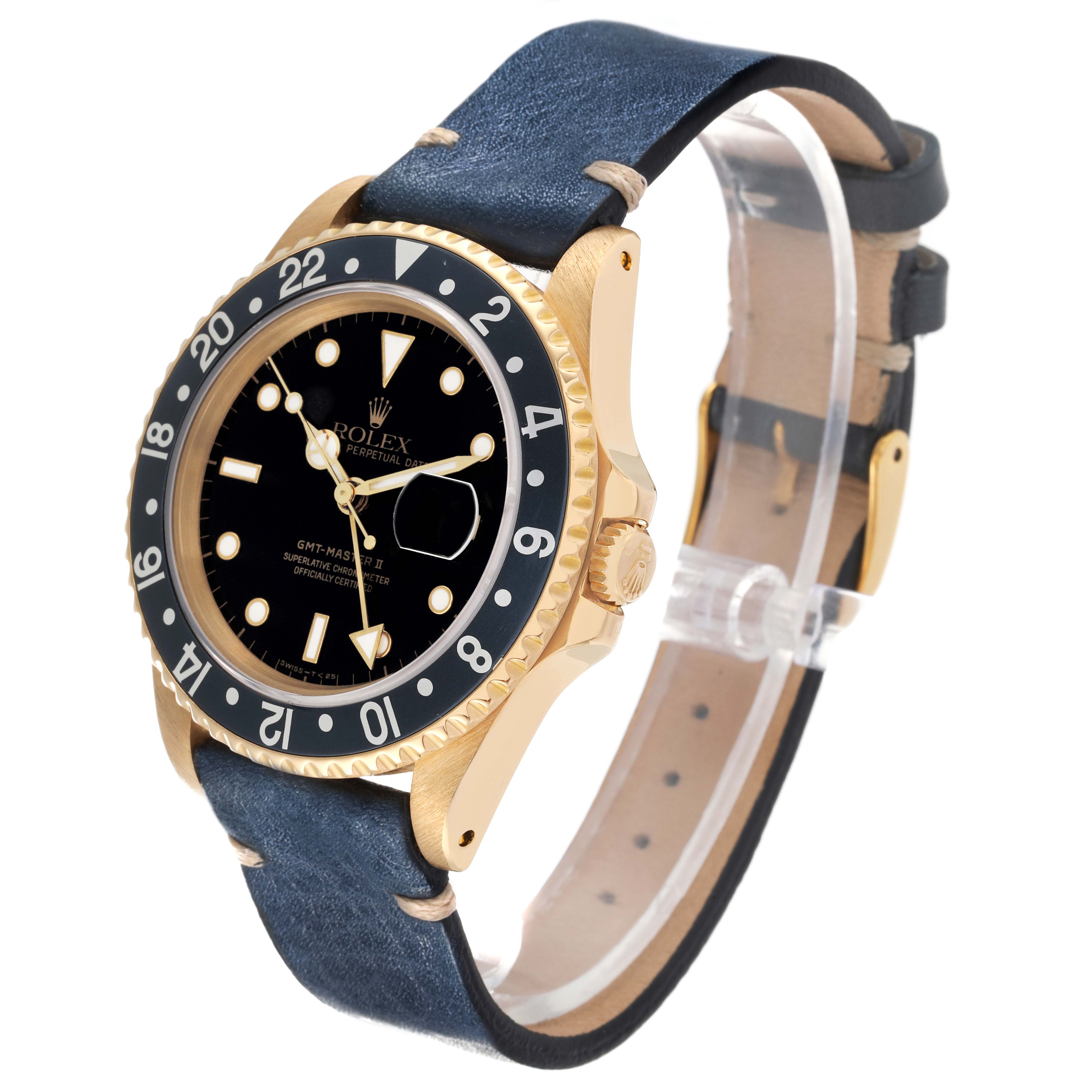 The Rolex GMT-Master 16718 Men's Yellow Gold Black Dial watch is shown at a slight angle, displaying its bezel, dial, case, crown, and strap.