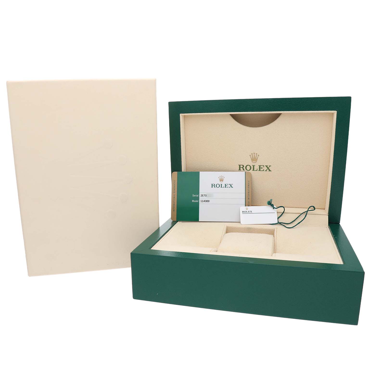 The image shows a Rolex Oyster Perpetual 114300 Men's Stainless Steel Grey Dial watch box, open with tags and documentation inside.