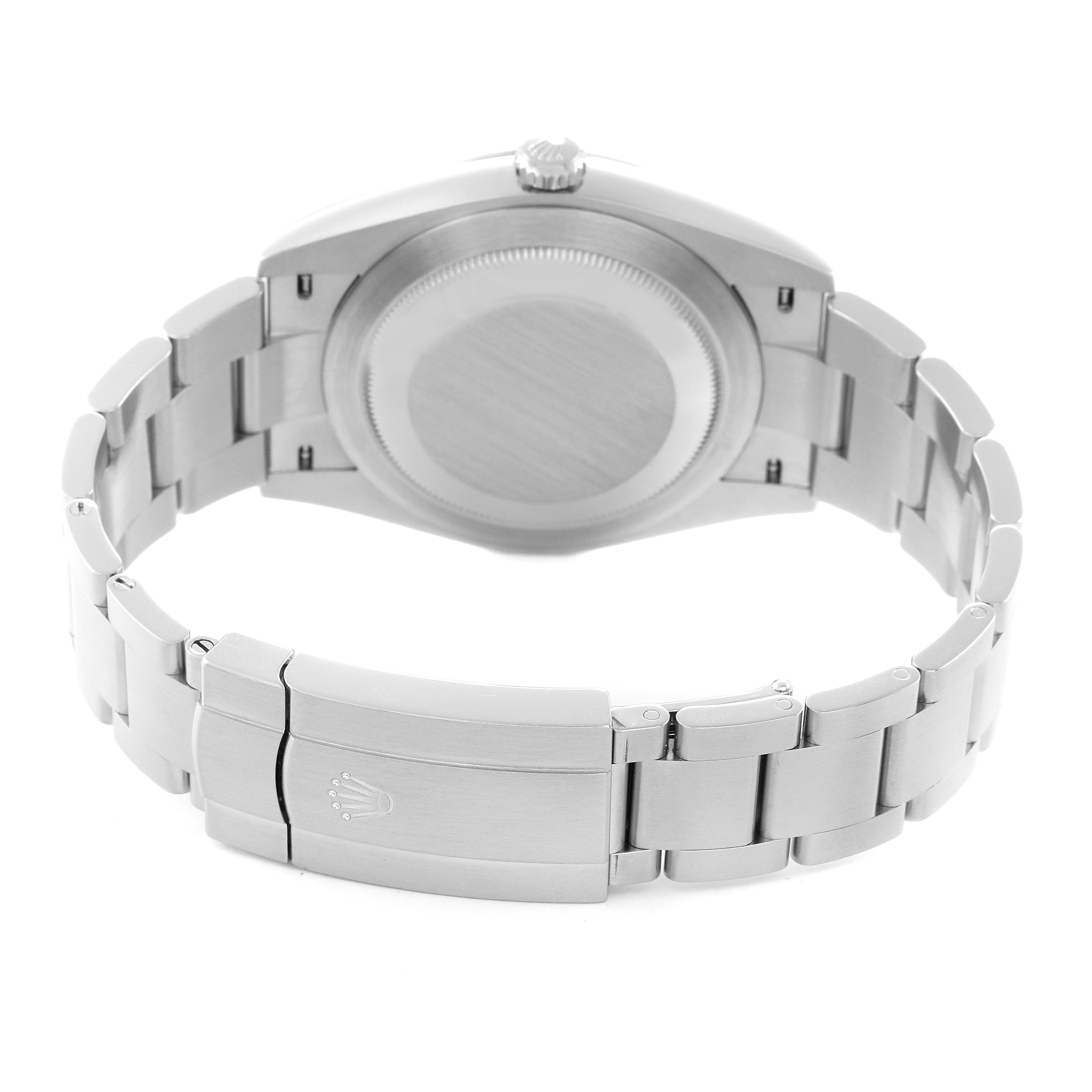 The image shows the back view of a Rolex Oyster Perpetual, model number 124300, highlighting the case back and the bracelet clasp with the Rolex logo.