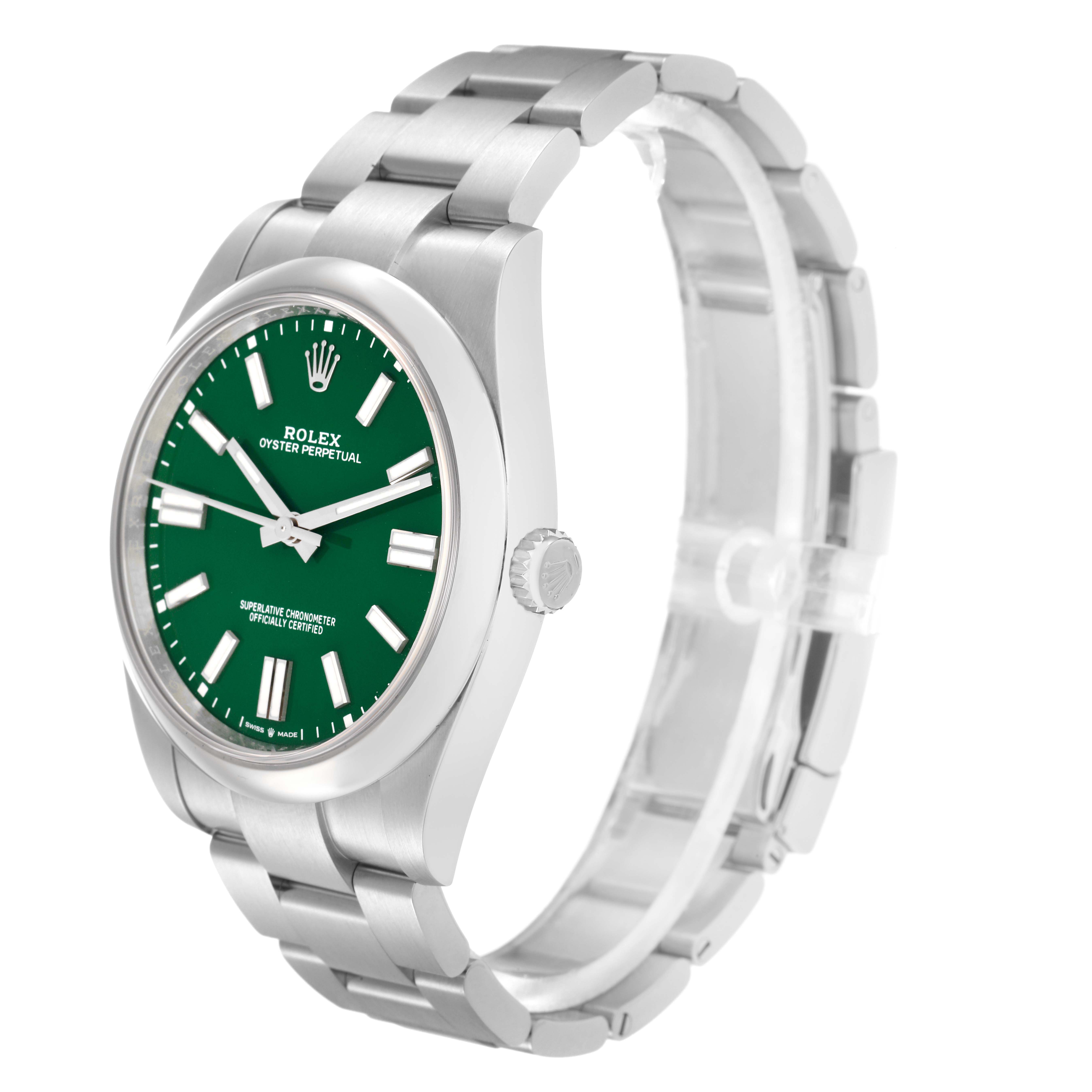The Rolex Oyster Perpetual model 124300 is shown at a three-quarter angle, highlighting the green dial, bezel, crown, and bracelet.
