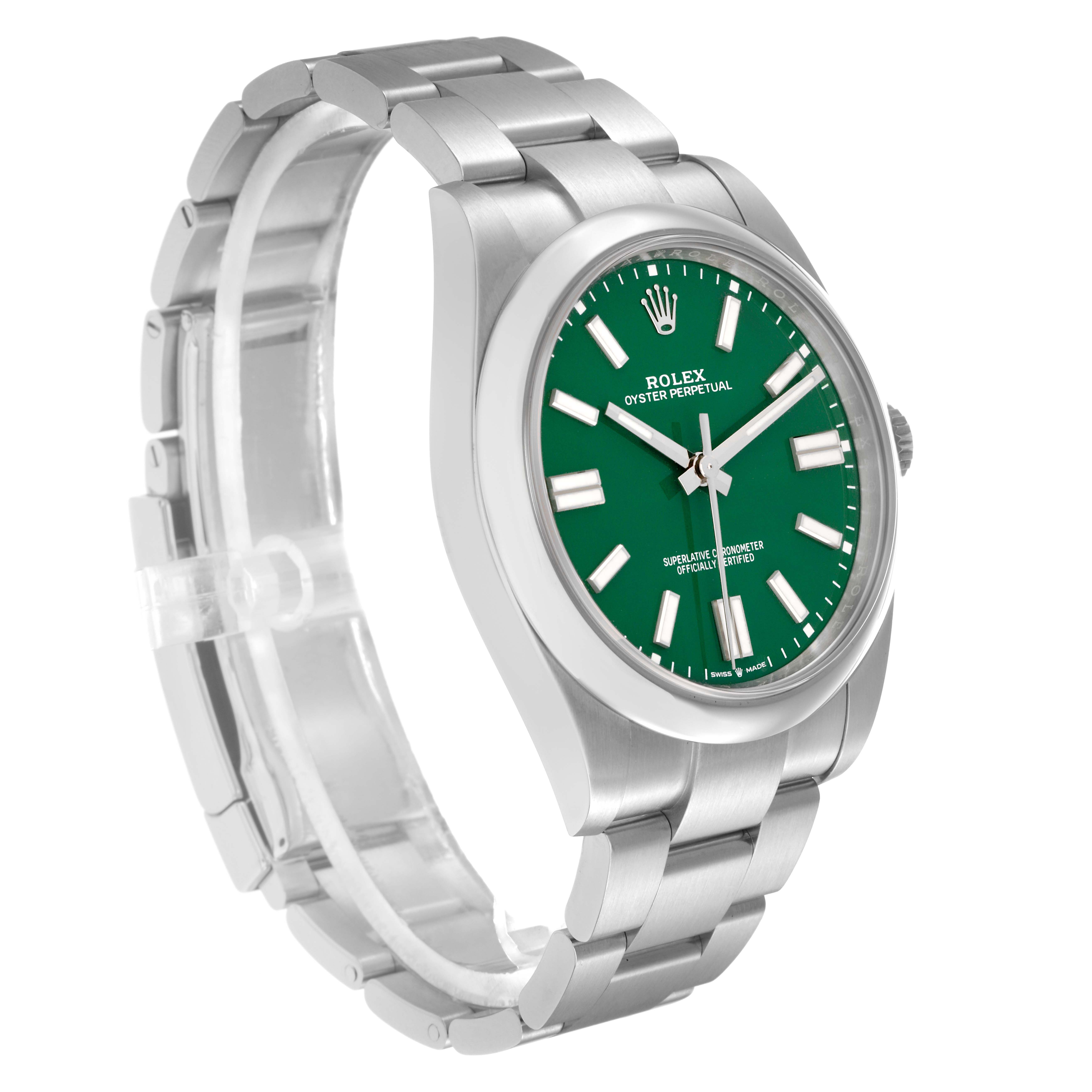 The Rolex Oyster Perpetual model 124300 is shown from a three-quarters angle, displaying the green dial, case, and part of the bracelet.
