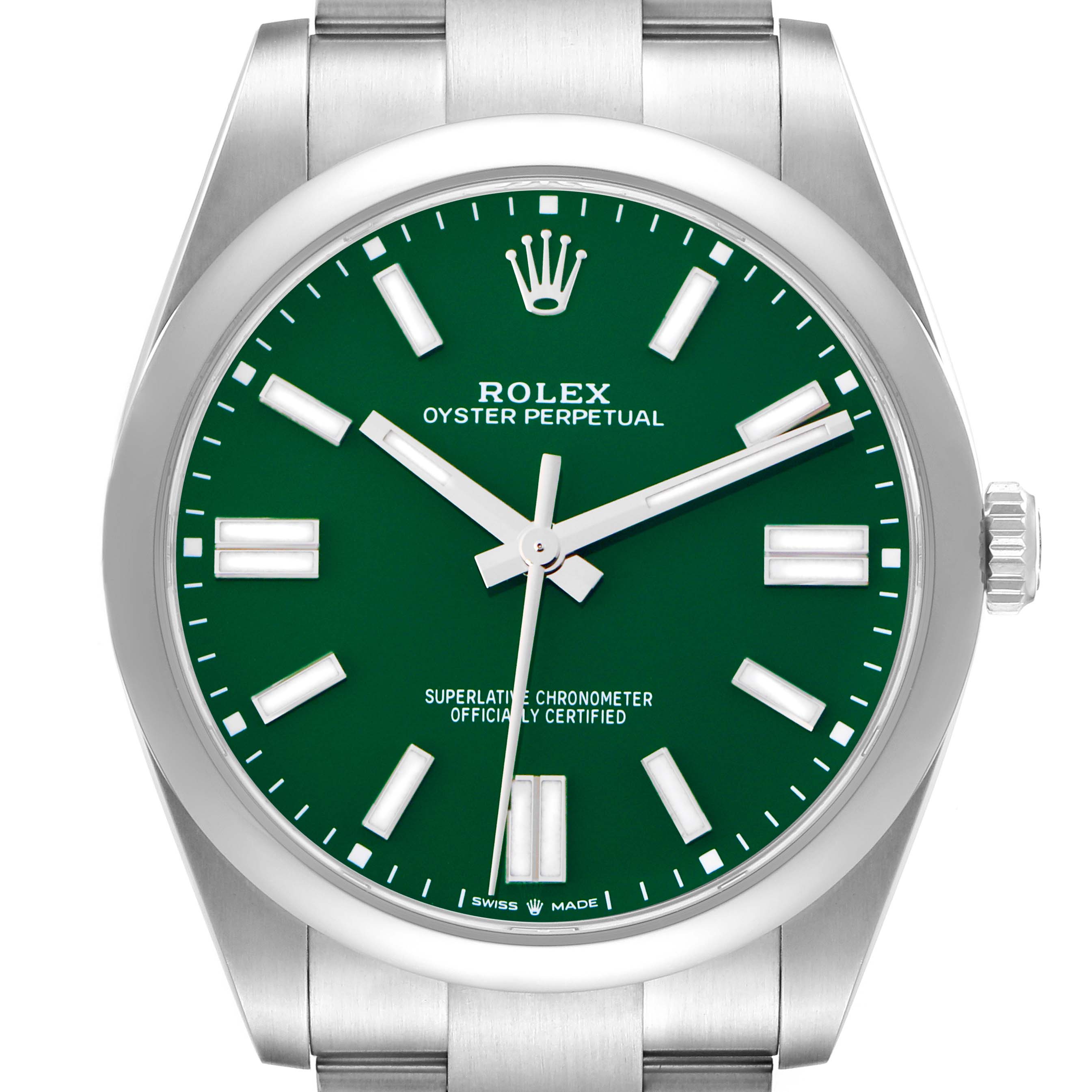 The image shows a frontal view of the Rolex Oyster Perpetual model 124300 men's watch, highlighting the green dial, markers, and stainless steel bracelet.