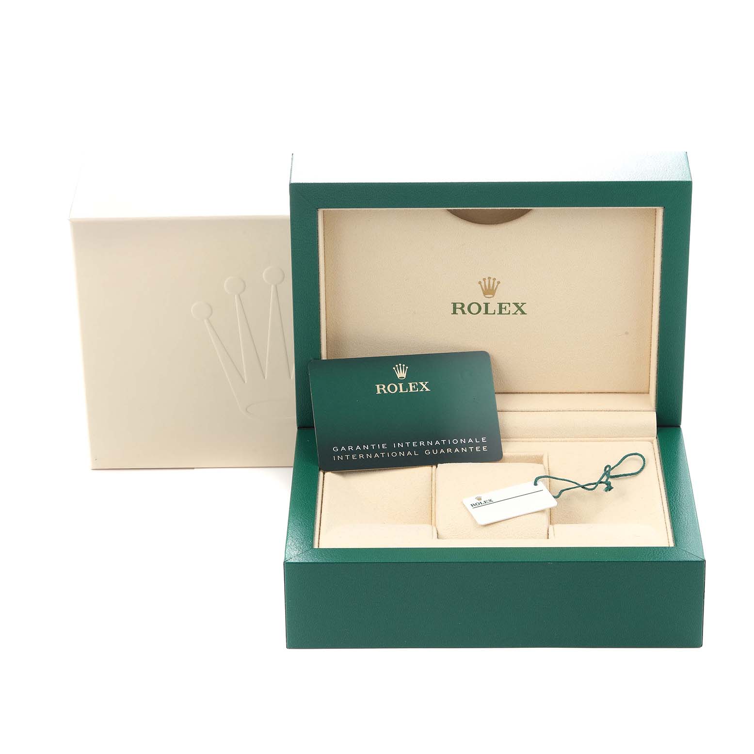 The image shows the packaging and accessories for a Rolex Oyster Perpetual model 124300, including the box, warranty card, and a tag.